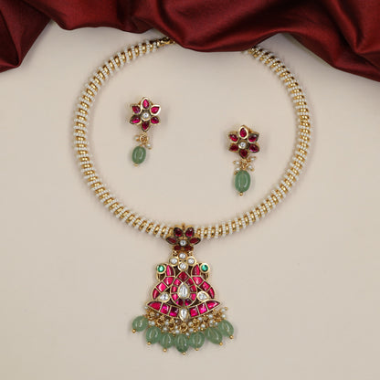 Jadau Necklace with Peacock Centrepiece and Repeating Floral Motifs