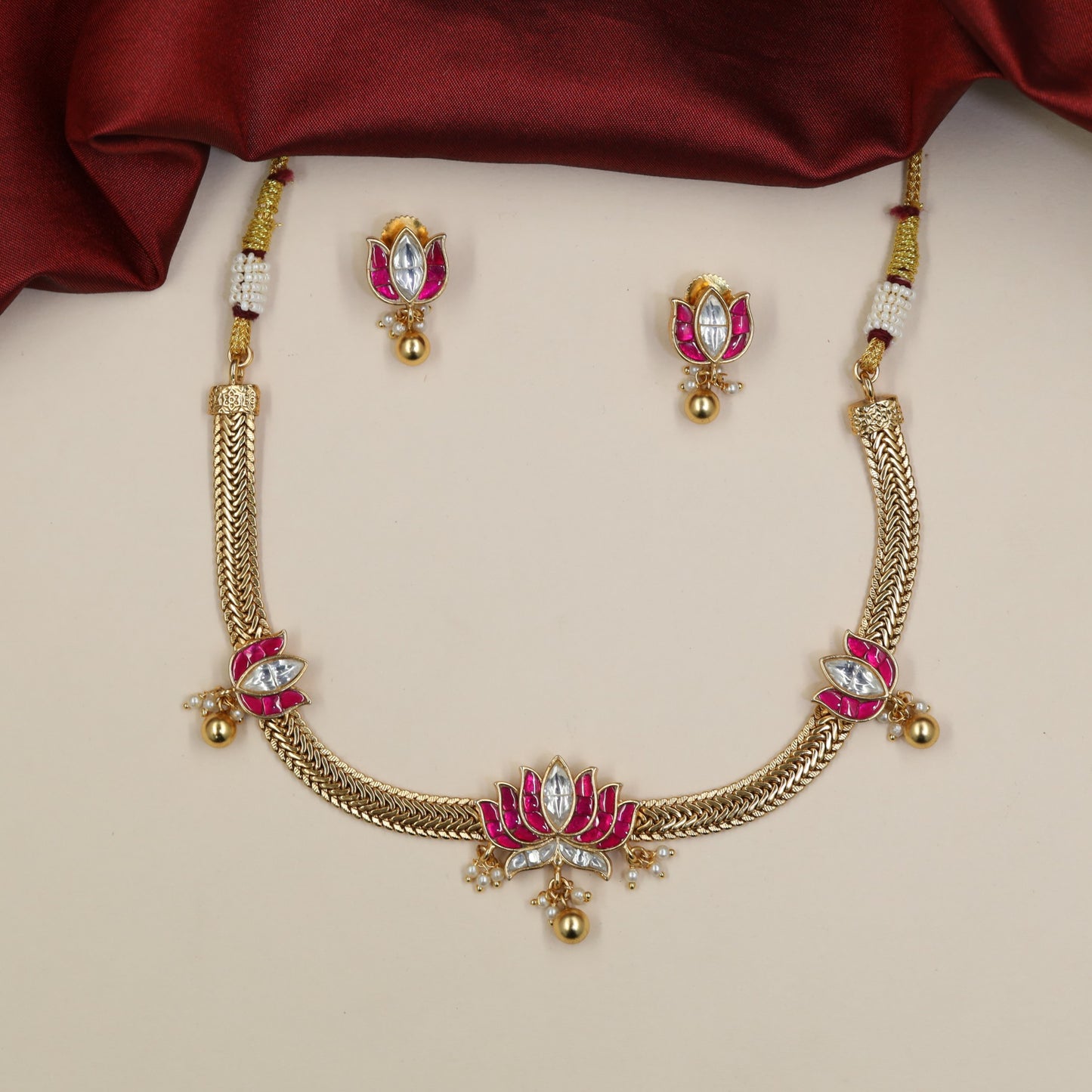 Jadau Necklace with Lotus Centrepiece and Intricate Braided Chainwork