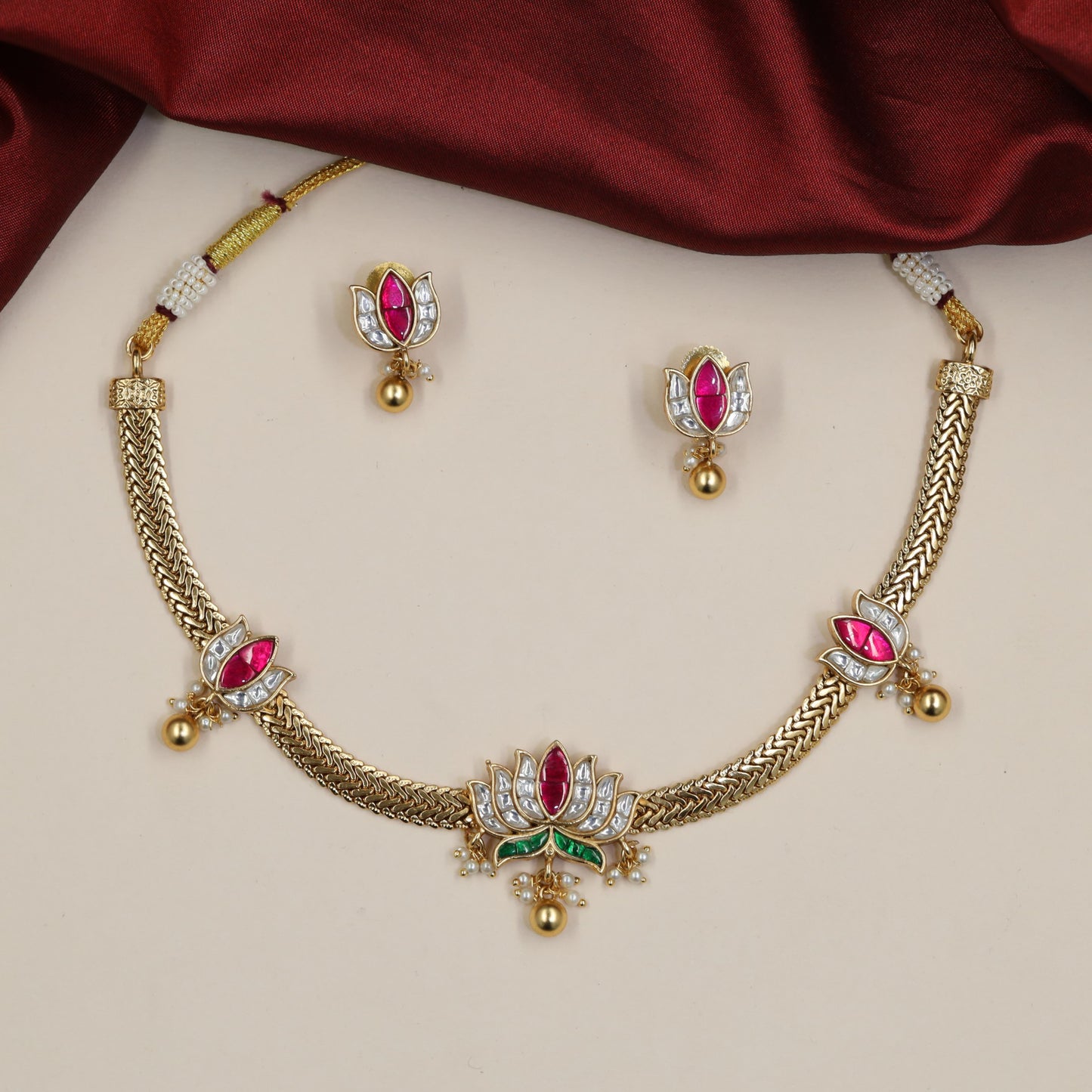 Jadau Necklace with Lotus Centrepiece and Intricate Braided Chainwork