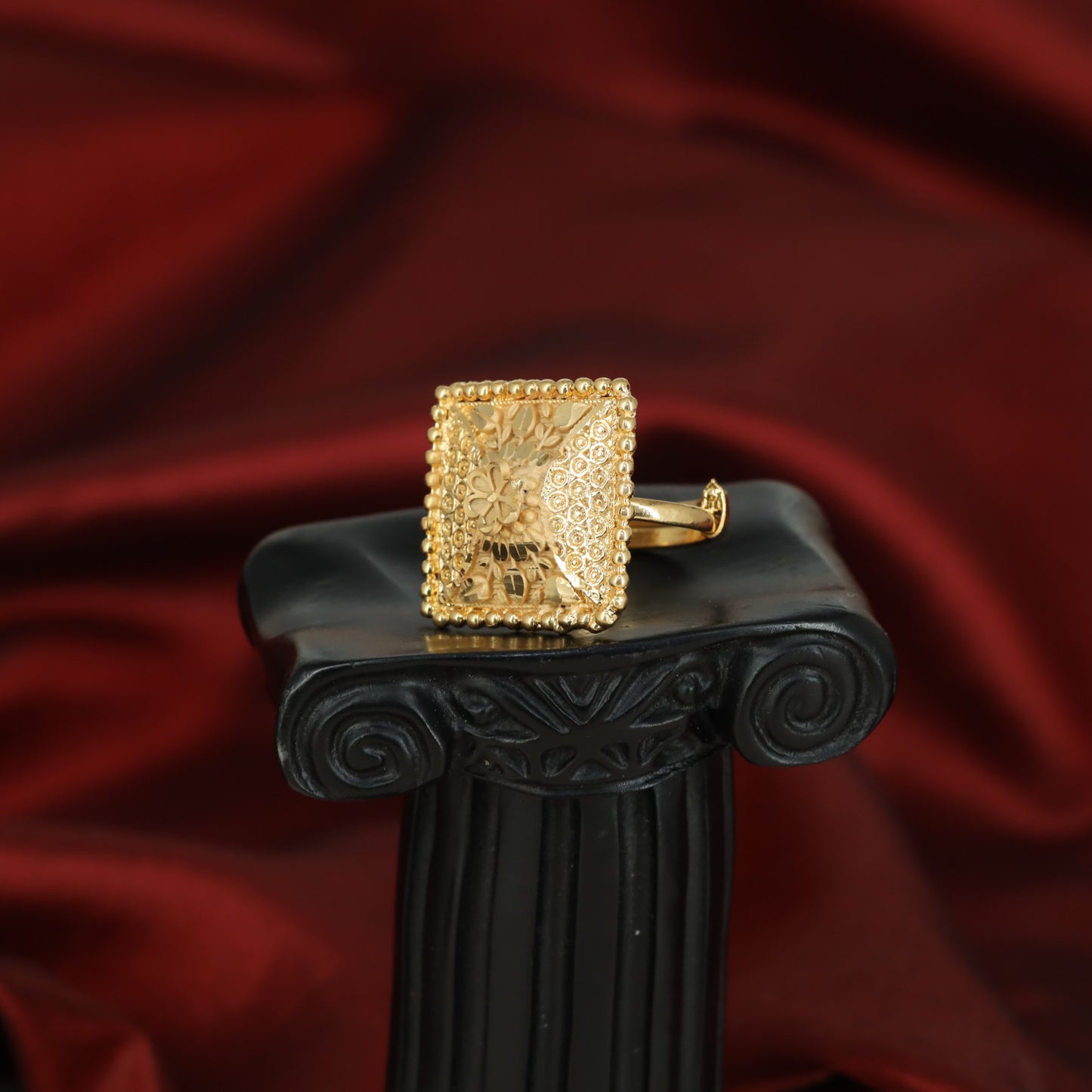 Square floral filigree finger ring with ornamental framing