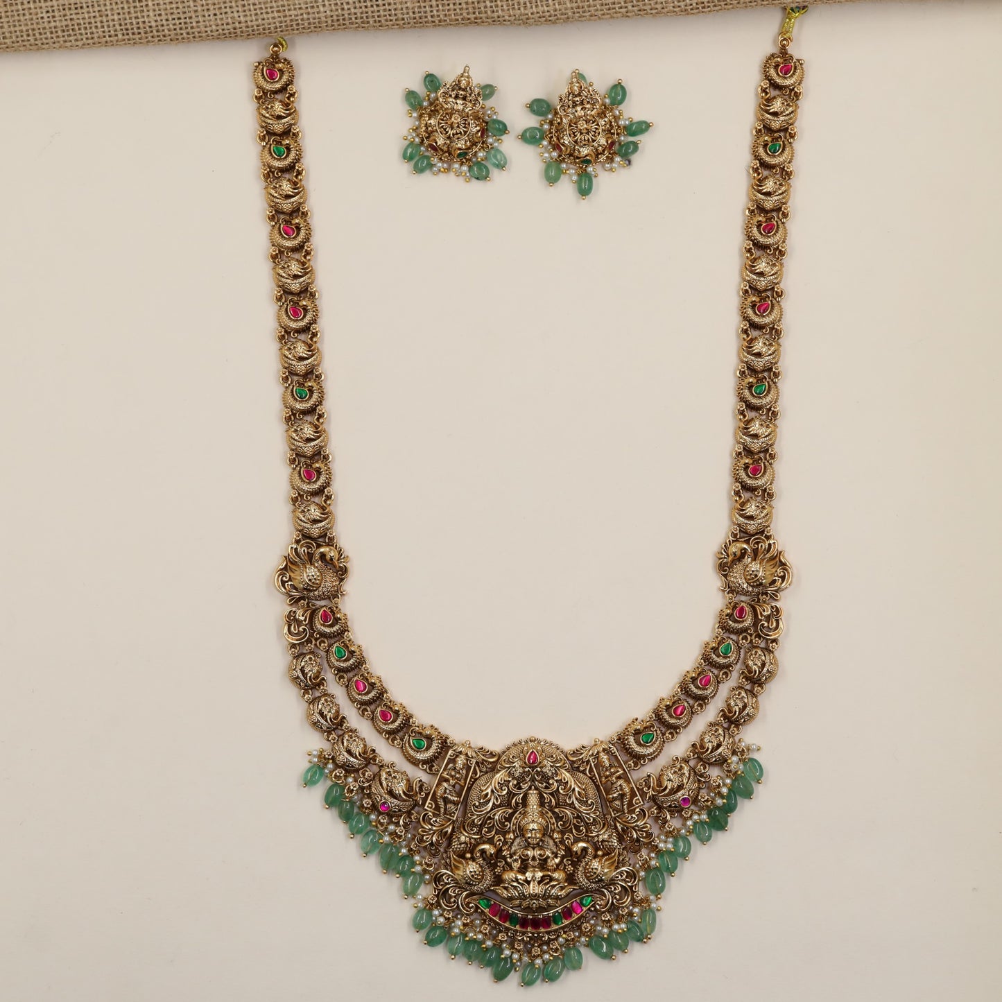 Antique Long Haara Showcasing Sculpted Linkwork, Lakshmi Detailing and Decorative Drops