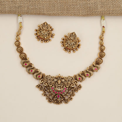 Antique Necklace with Lakshmi Centre Pendant and Repeating Circular Links