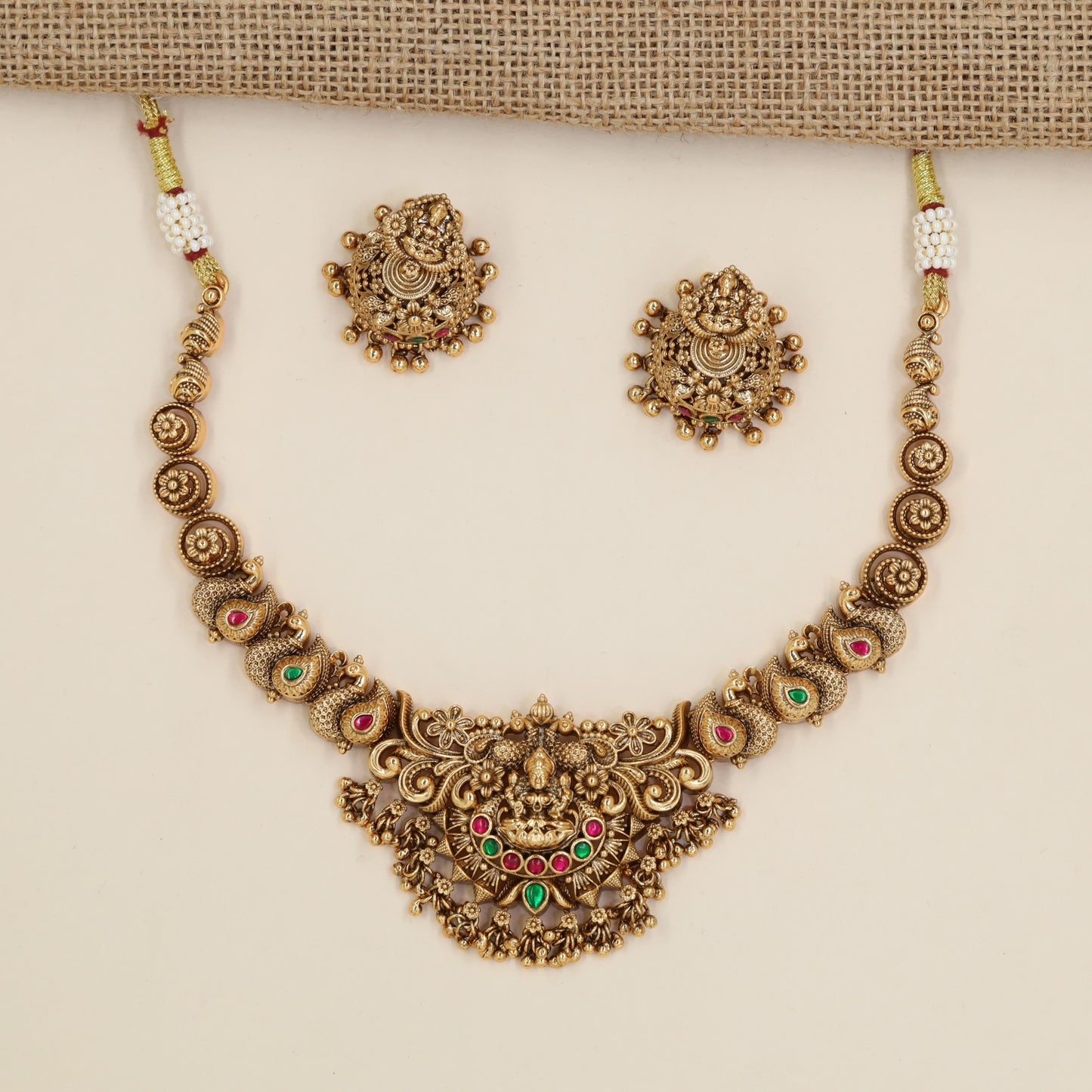 Antique Necklace with Lakshmi Centre Pendant and Repeating Circular Links