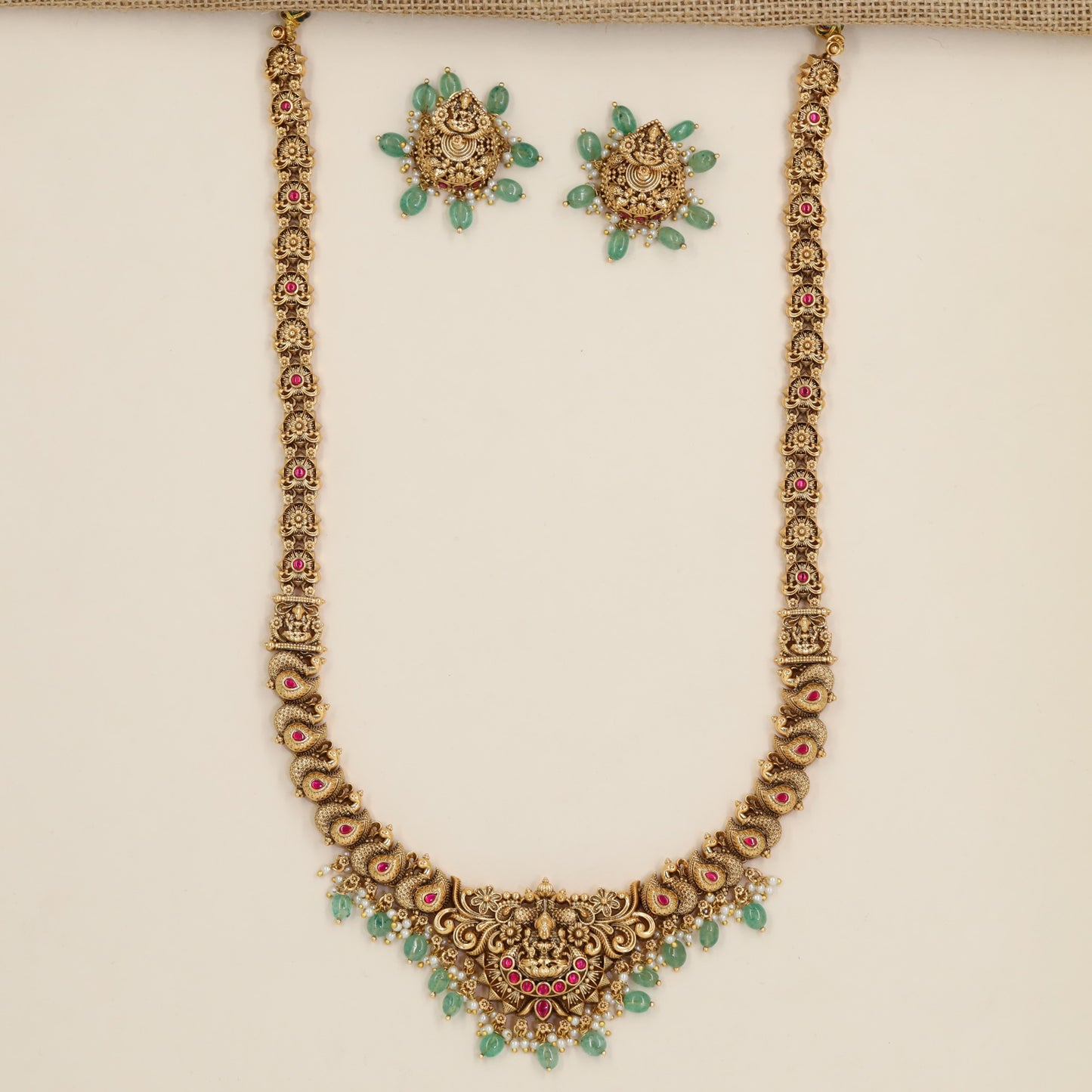 Antique Long Haara with Lakshmi Medallion and Sculpted Peacock Link Details