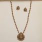 Antique Chain Showcasing a Grand Lakshmi Pendant and Decorative Round Links