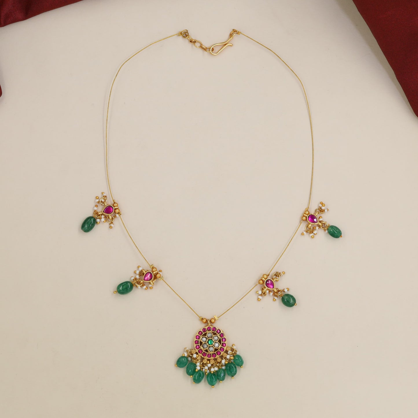 Jadau Necklace with Scattered Pendant Links and Centre Medallion