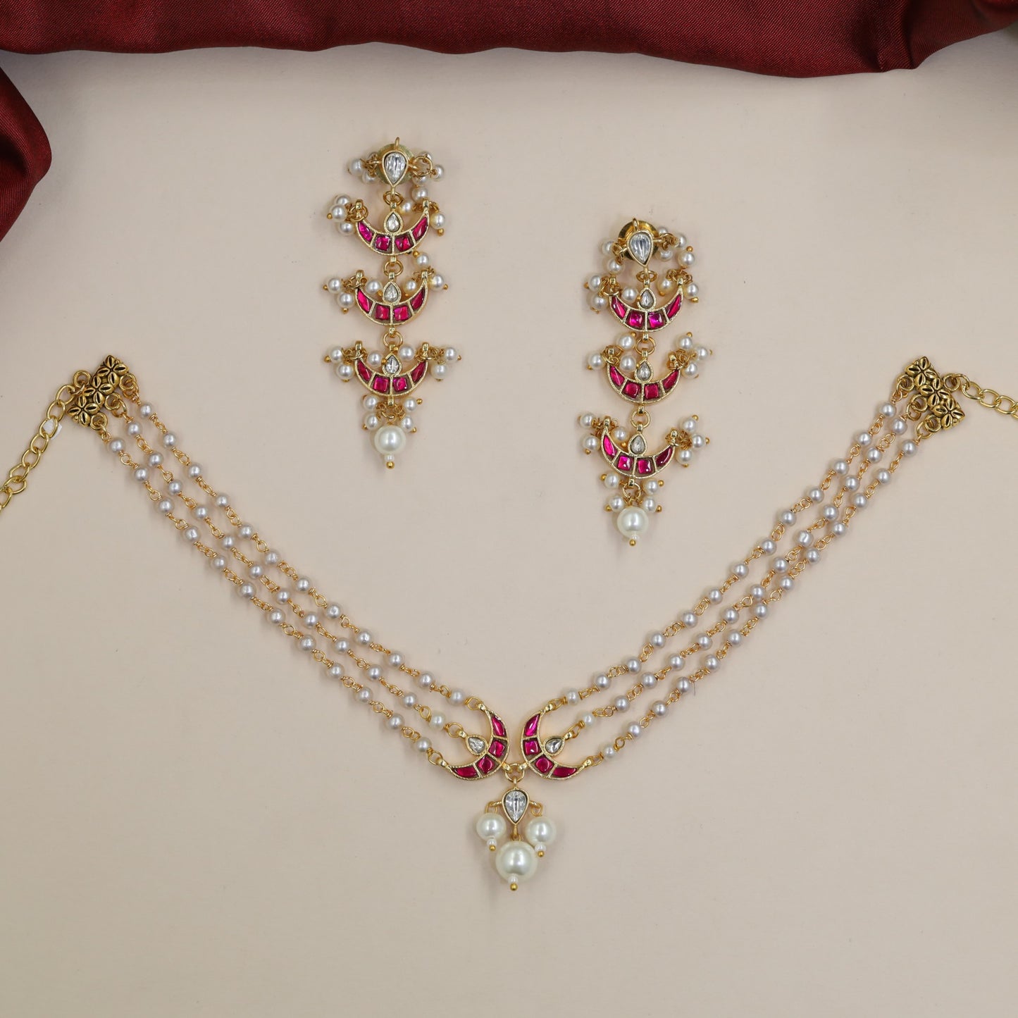 Jadau Beads Choker with Triple Pearl Strands and Crescent Links