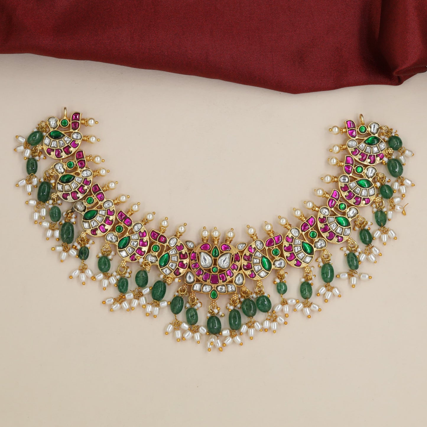 Festive Jadau Necklace with Curved Petal Detailing and Pearl Drops