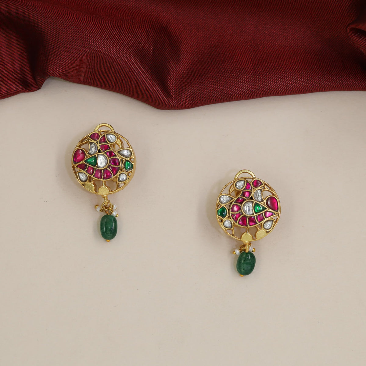 Jadau Studs with Peacock Motif and Circular Frame