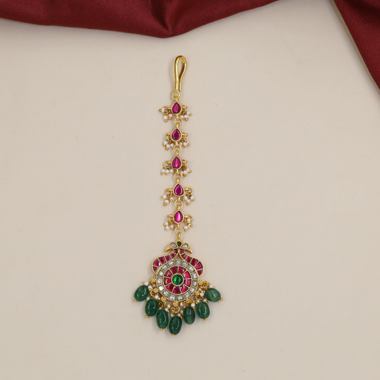 Jadau Tikka Featuring Peacock Detailing and Floral Medallion