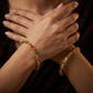 Traditional Bangles Showcasing Repeating Paisley Links and Fine Ornamental Work