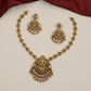 Regal Lakshmi Necklace Featuring Repeated Floral Forms and Ornamental Centre Detailing
