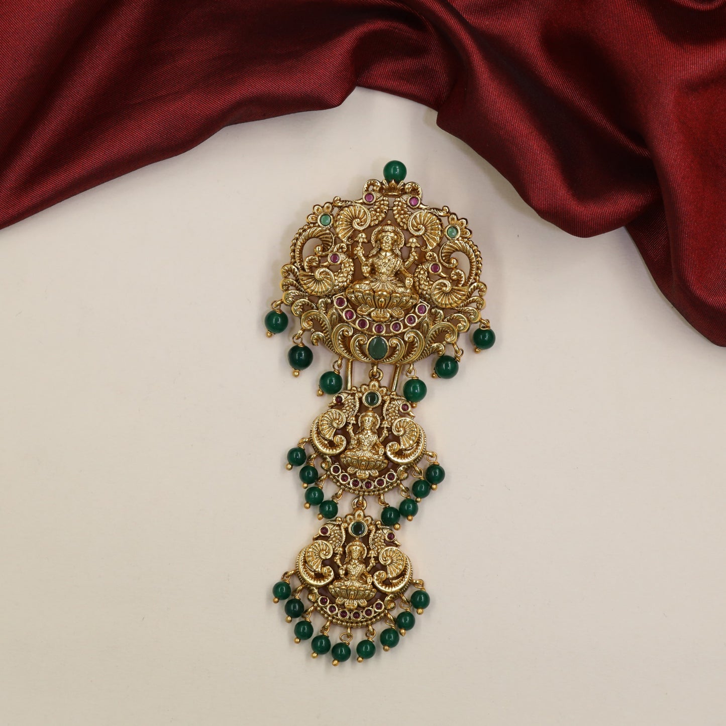 Couture Lakshmi Antique Jade Bille with peacock forms and ornate scrollwork