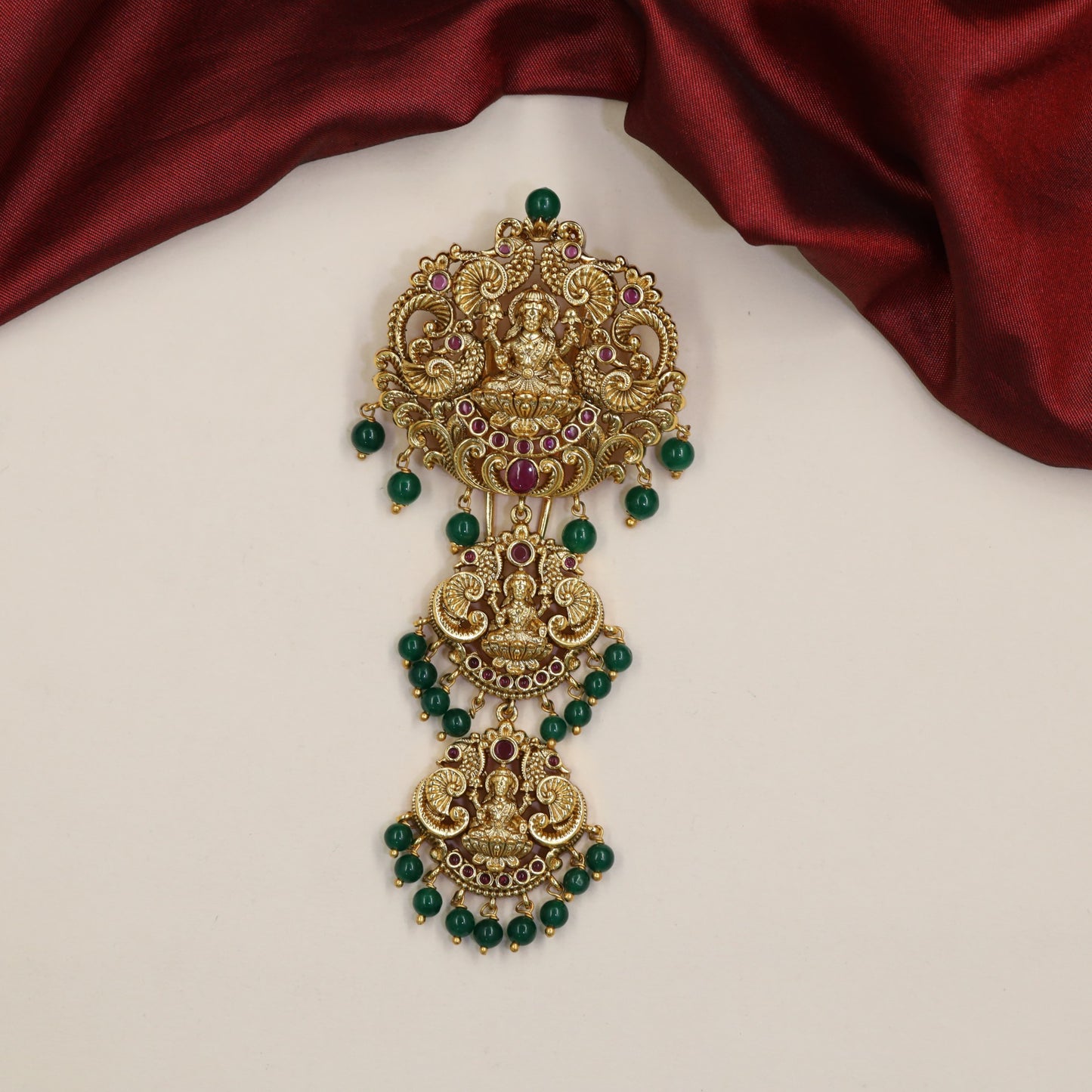 Couture Lakshmi Antique Jade Bille with peacock forms and ornate scrollwork