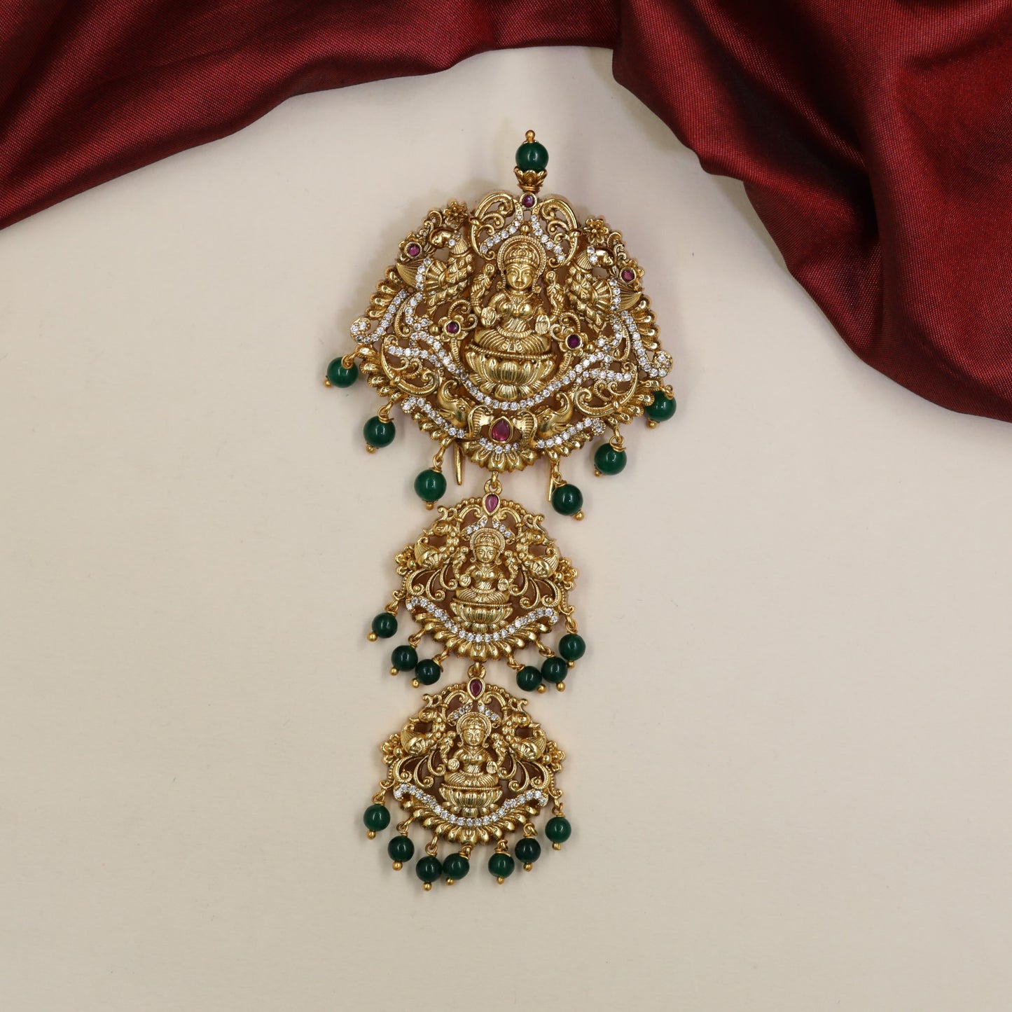 Gajalakshmi Antique Jade Bille with ornate elephant detailing and hanging drops