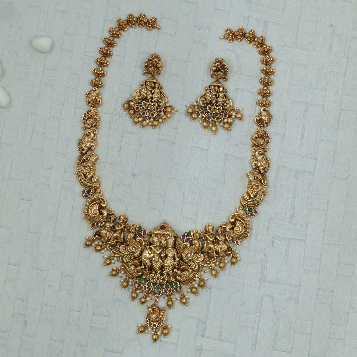 Grand Peacock Antique Long Haara with intricate Radha Krishna pendant work