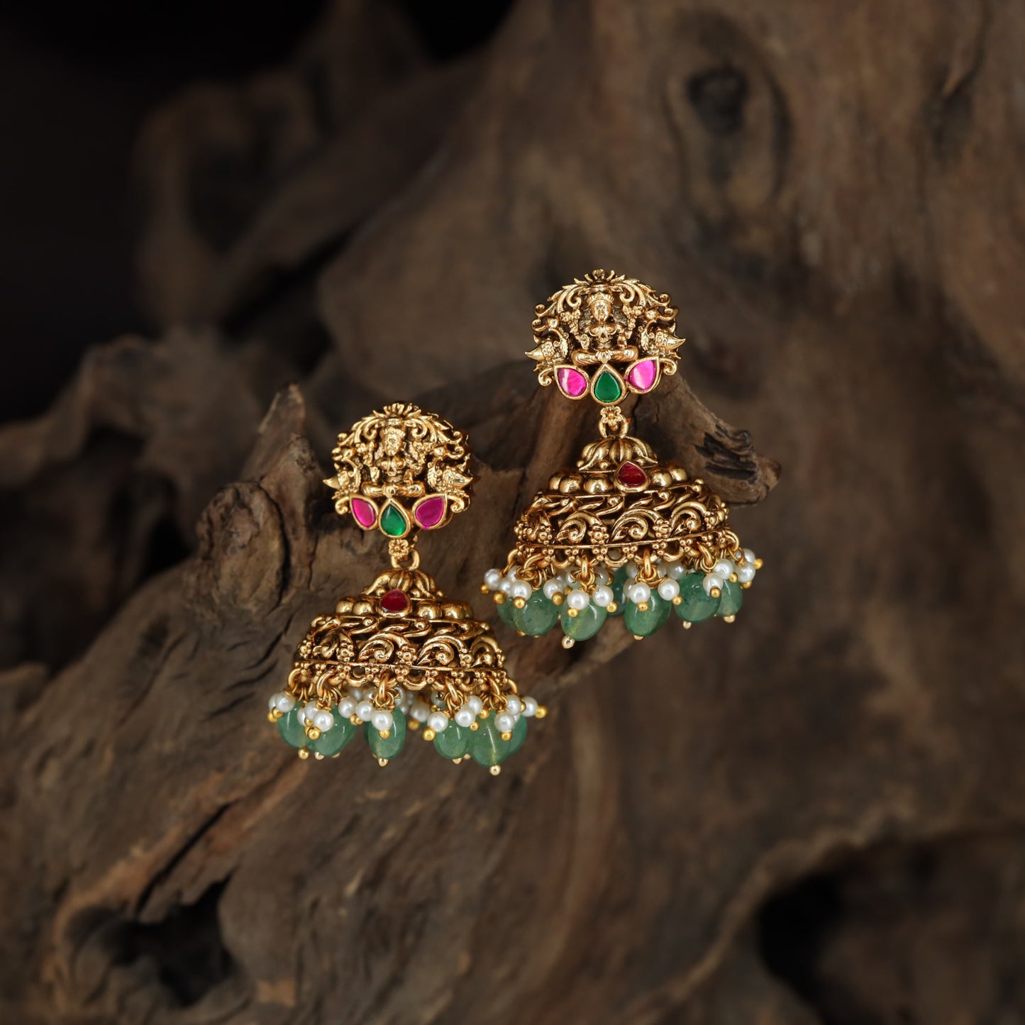 Sculpted Lakshmi Antique Jumka with an ornate dome and suspended bead fringe