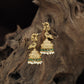 Temple-inspired Antique Jumka featuring peacock forms and engraved dome work