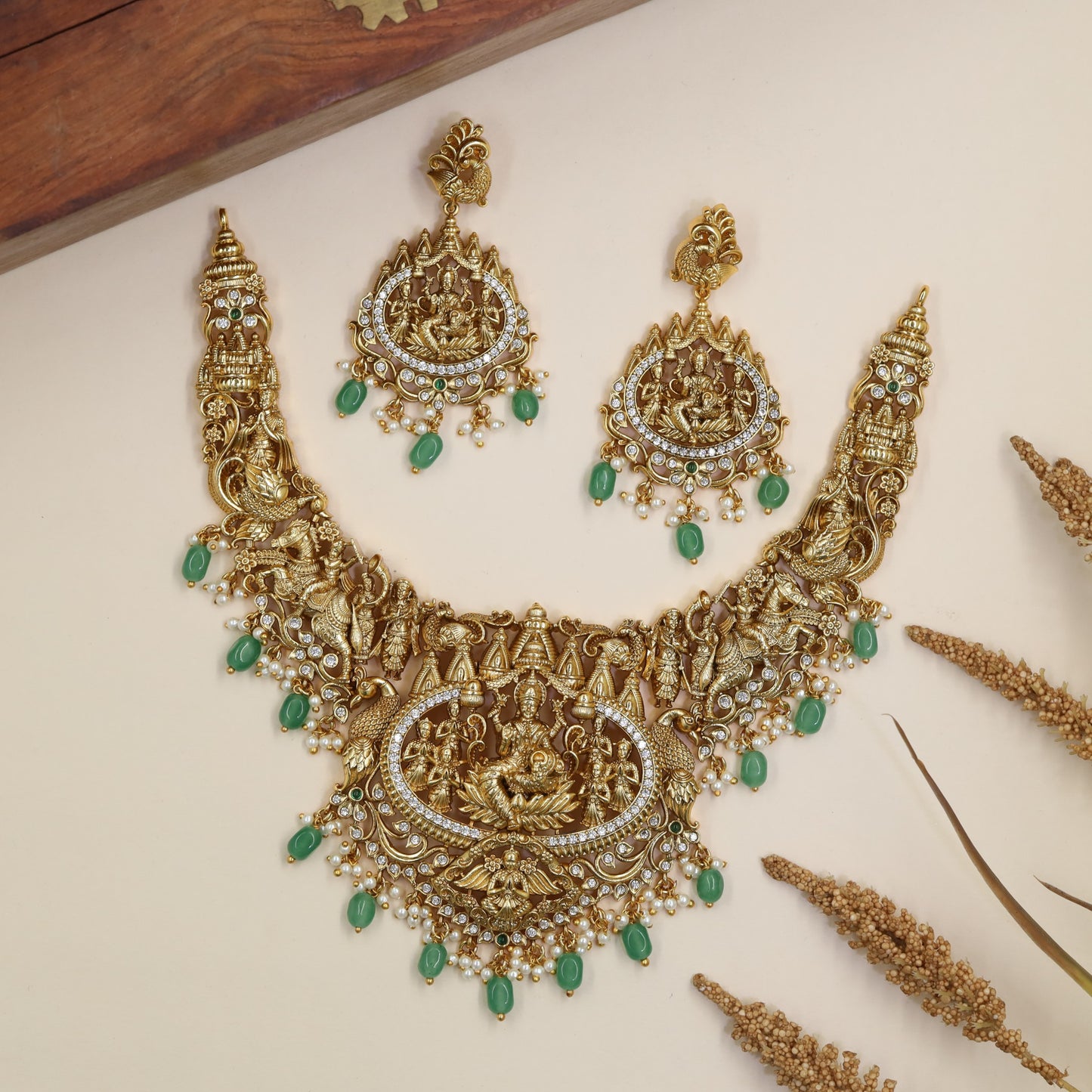 Traditional Antique Necklace featuring devotional panels and an elaborate Lakshmi pendant