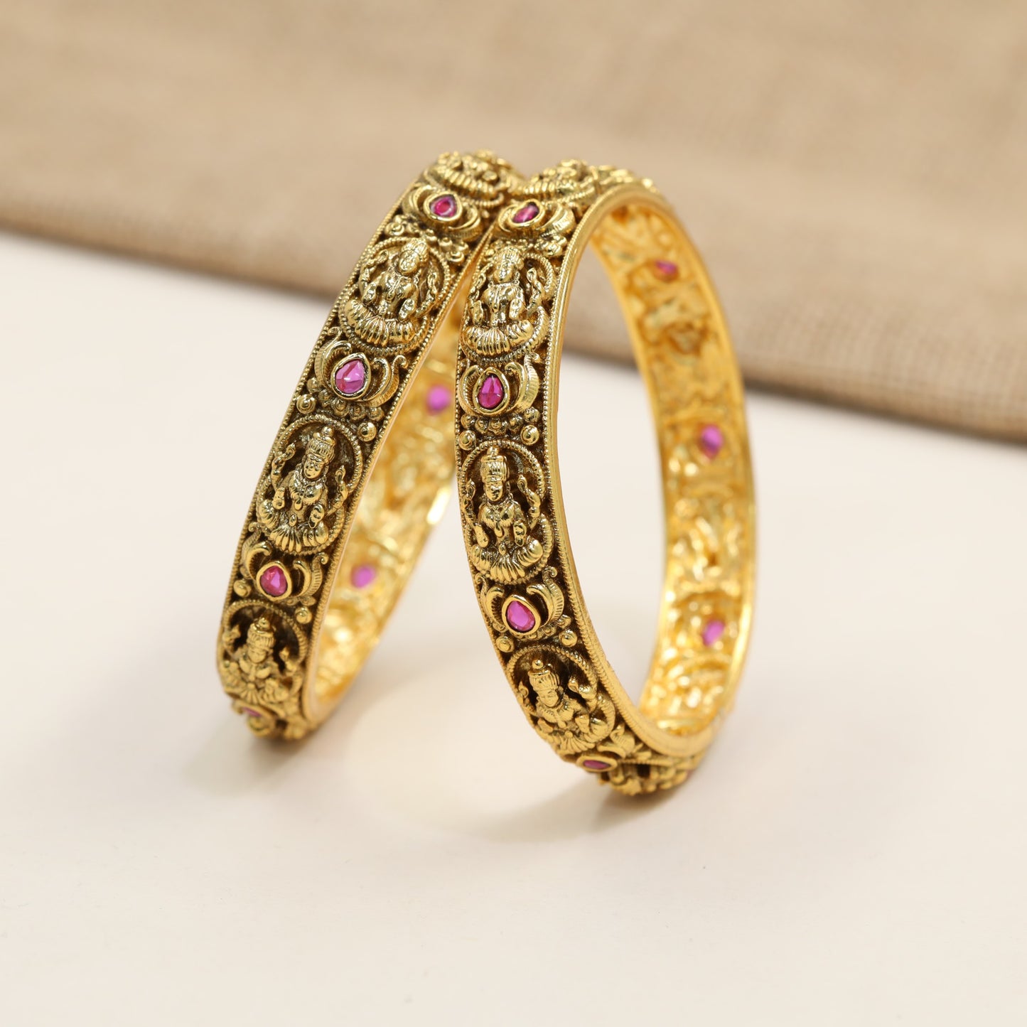 Lakshmi Antique Bangles with repeated deity panels and sculpted scrollwork