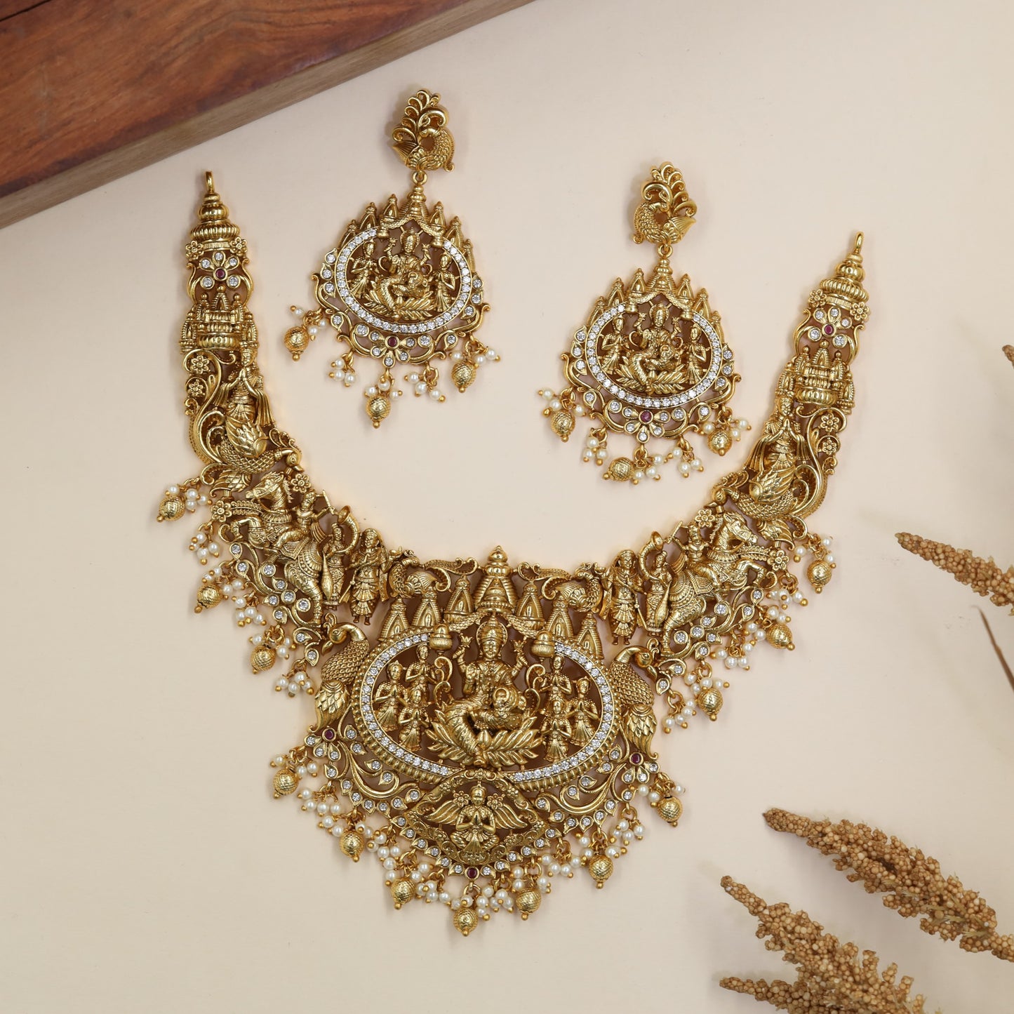 Traditional Antique Necklace featuring devotional panels and an elaborate Lakshmi pendant