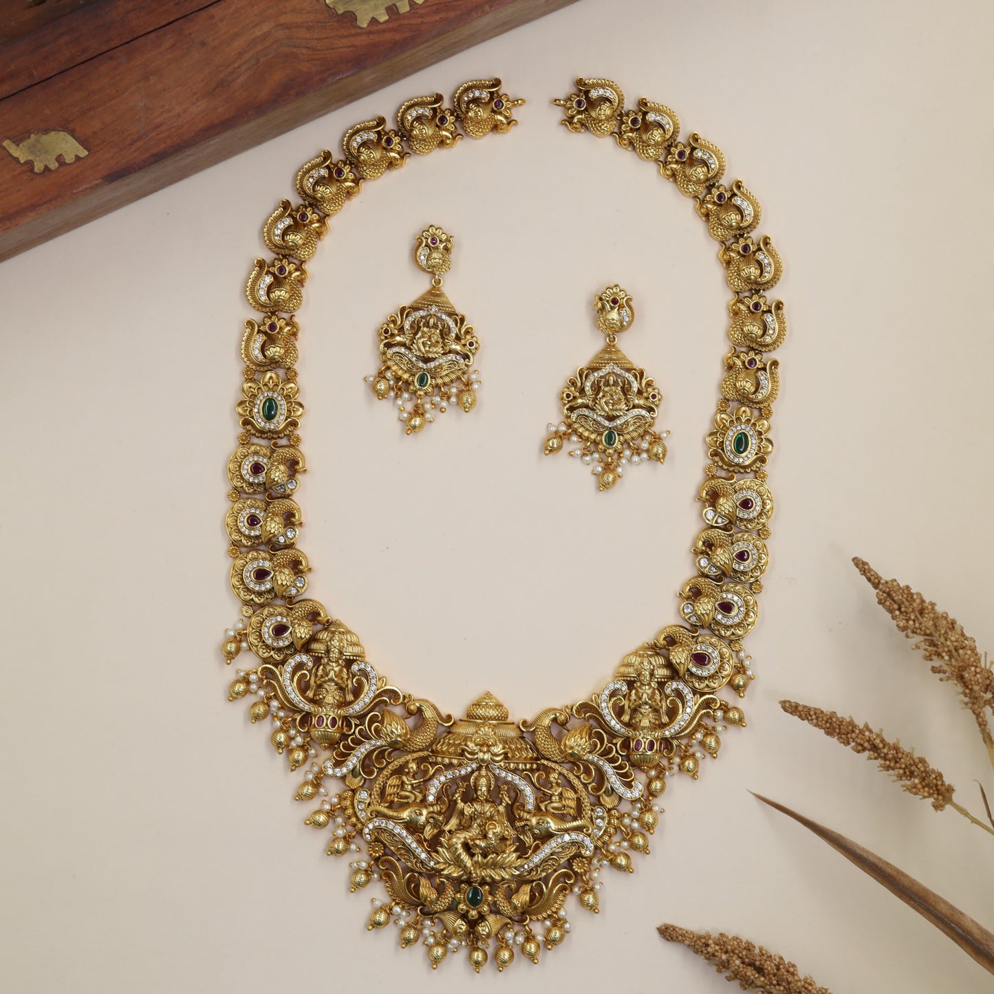 Traditional Antique Long Haara featuring Lakshmi, curved scrollwork and drop accents
