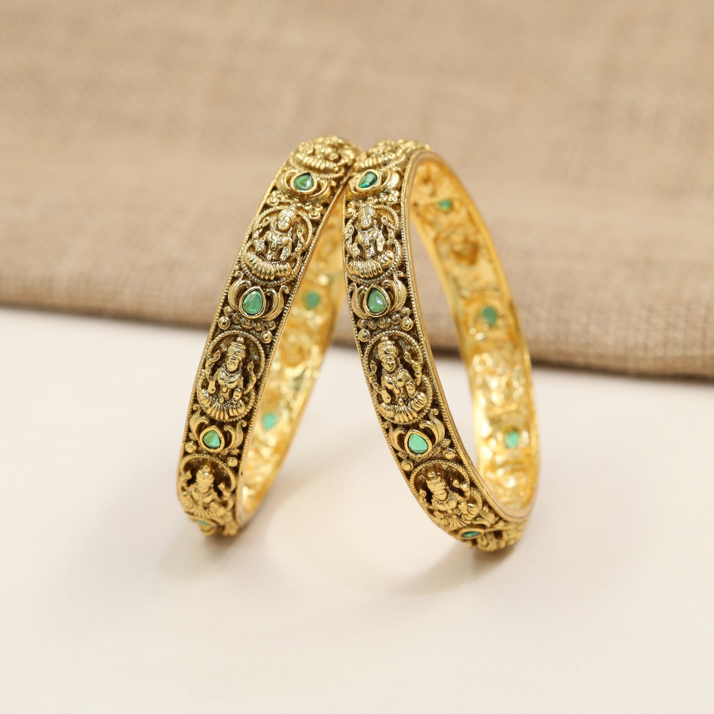 Lakshmi Antique Bangles with repeated deity panels and sculpted scrollwork