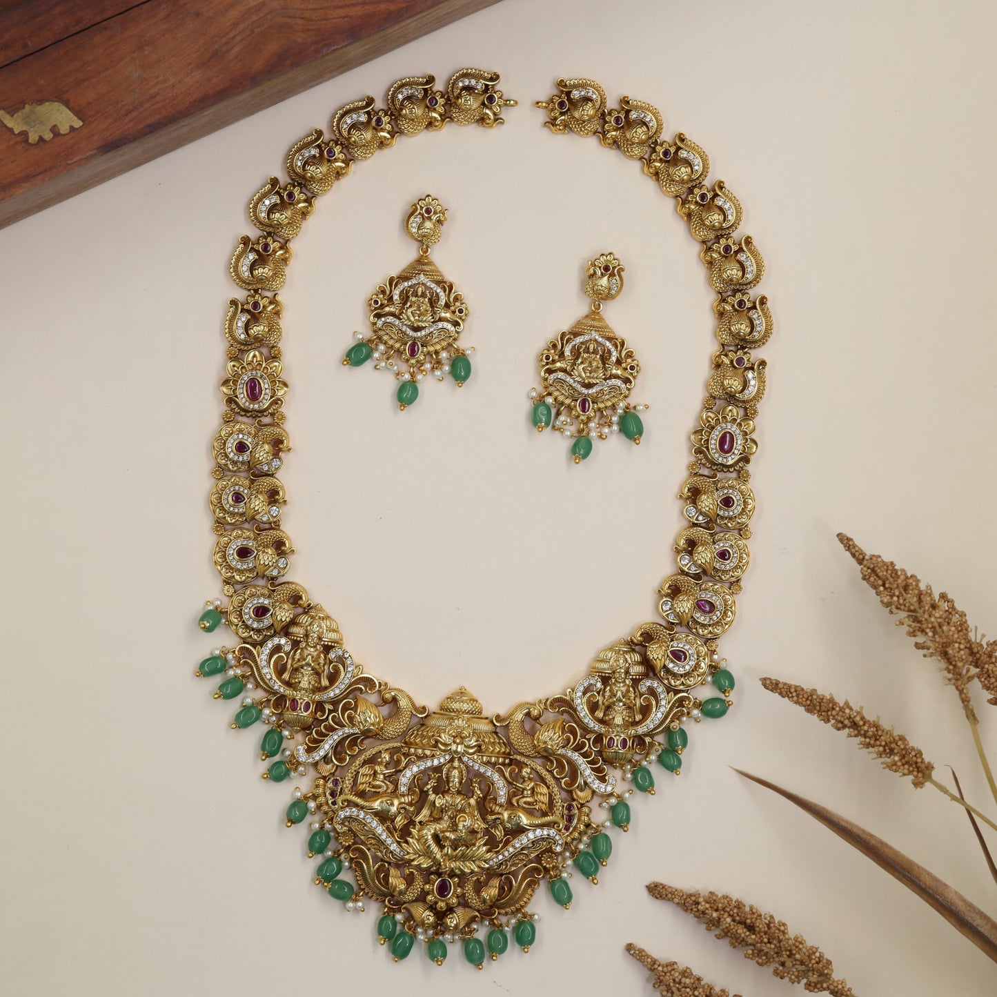 Traditional Antique Long Haara featuring Lakshmi, curved scrollwork and drop accents