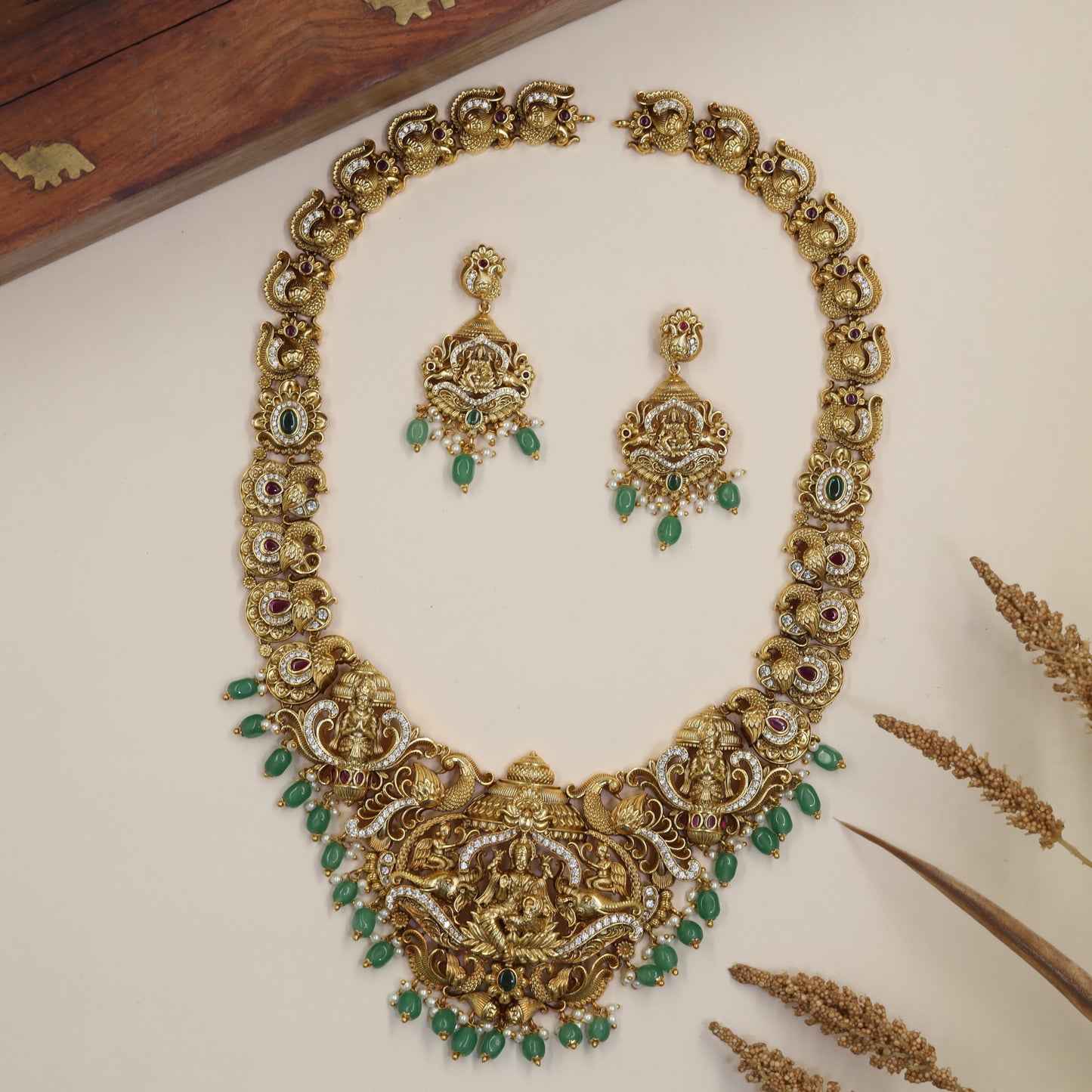 Traditional Antique Long Haara featuring Lakshmi, curved scrollwork and drop accents