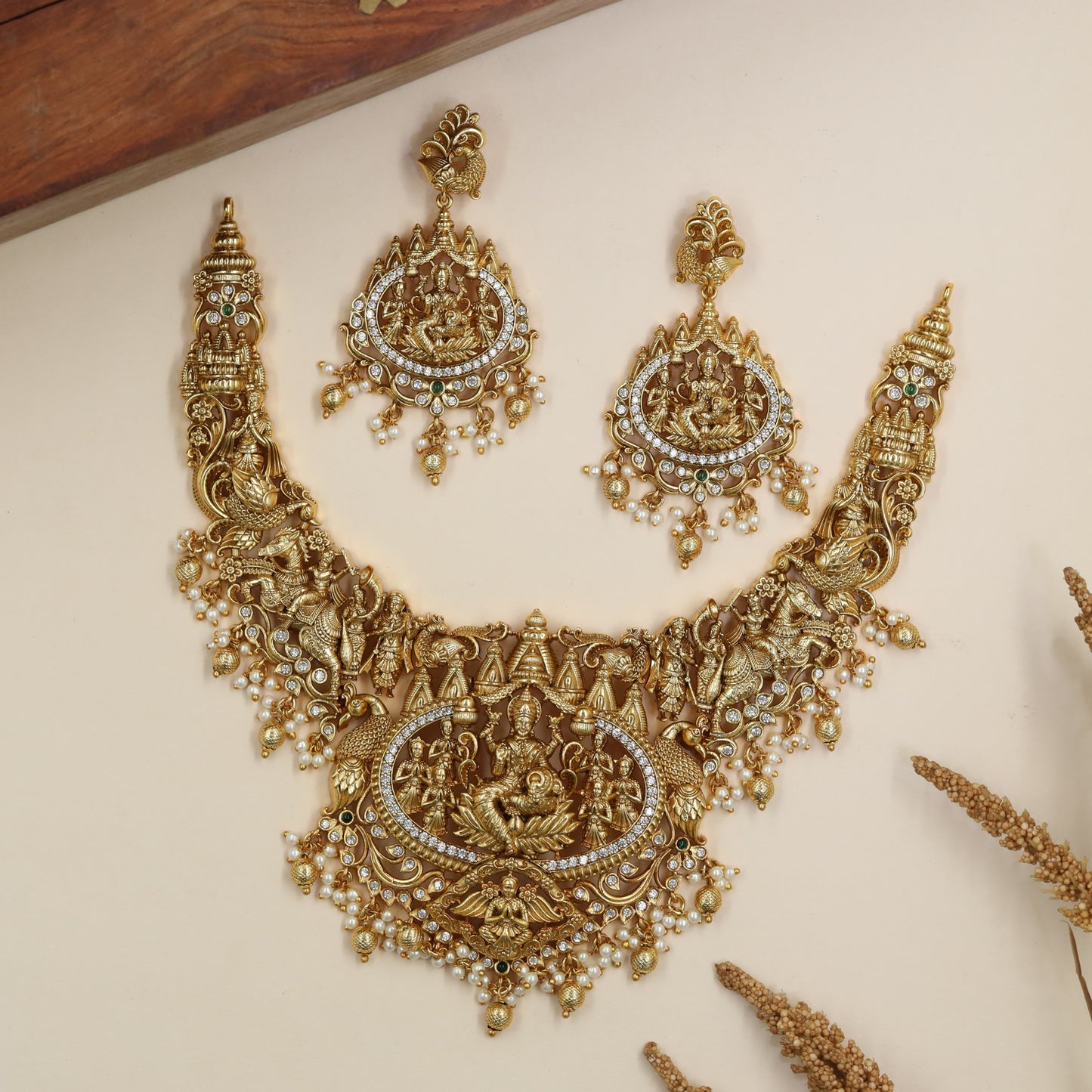 Traditional Antique Necklace featuring devotional panels and an elaborate Lakshmi pendant