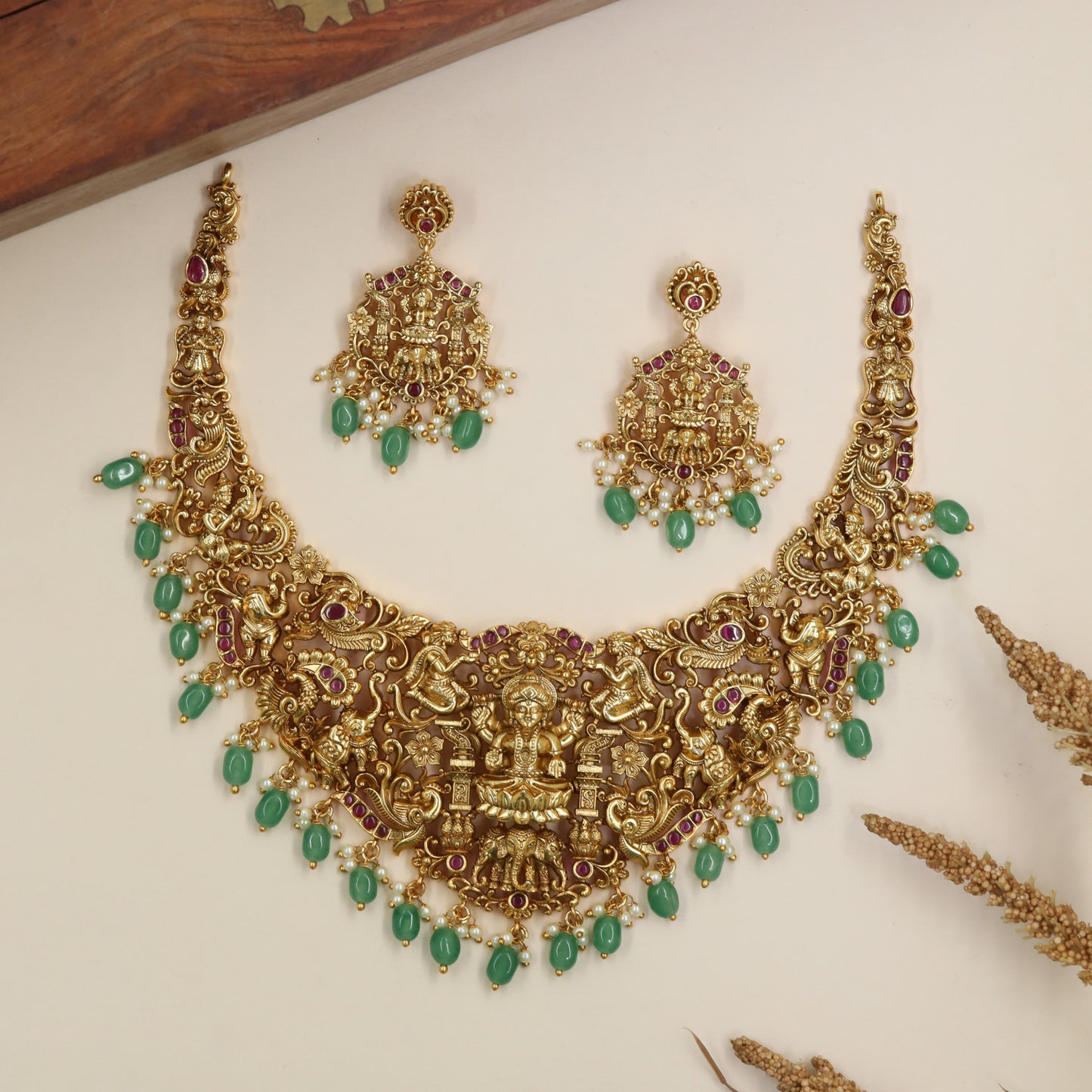 Lakshmi Antique Necklace with peacock panels and sculpted centrework