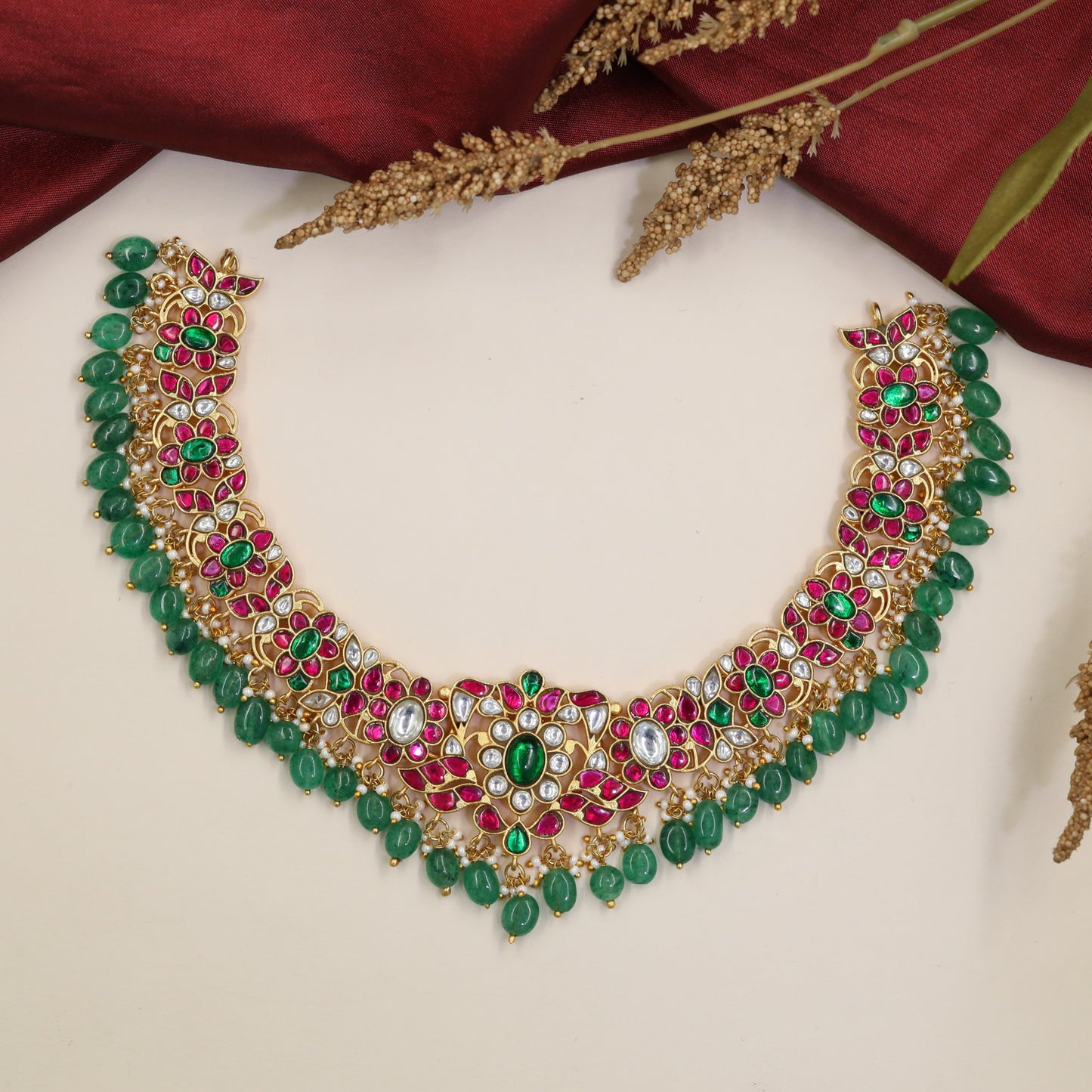 Occasion wear Jadau Necklace with sculpted flowers and bead detailing