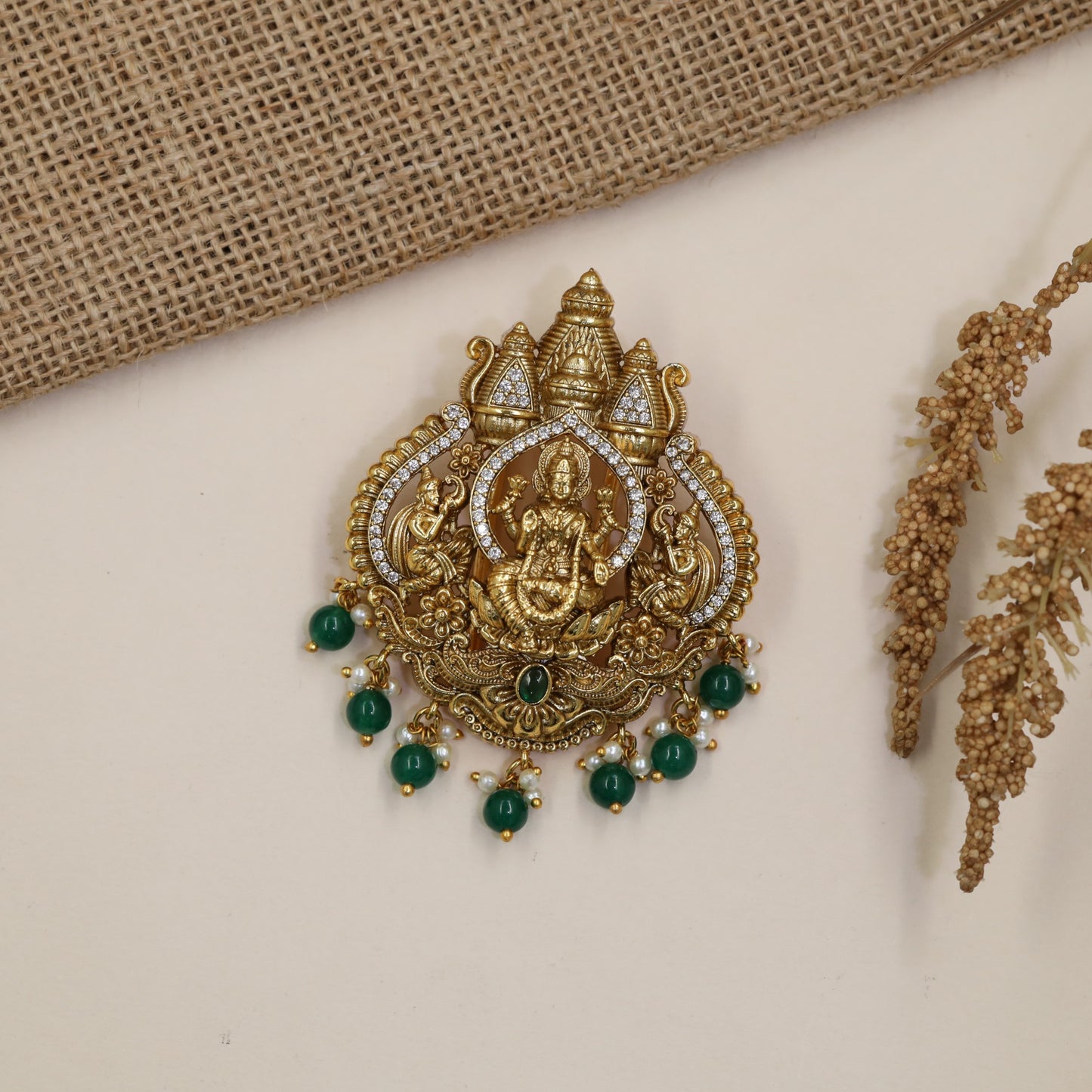 Devotional Antique Jade Bille with seated Lakshmi, curved arches and dropwork