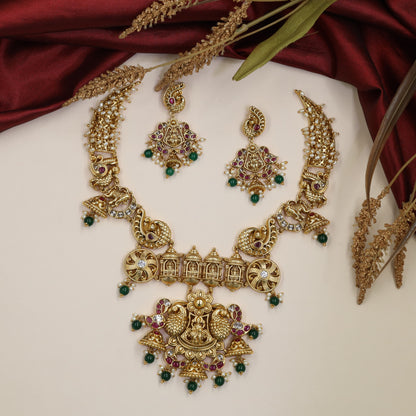 Traditional Lakshmi Antique Necklace with sculpted peacocks and hanging beads