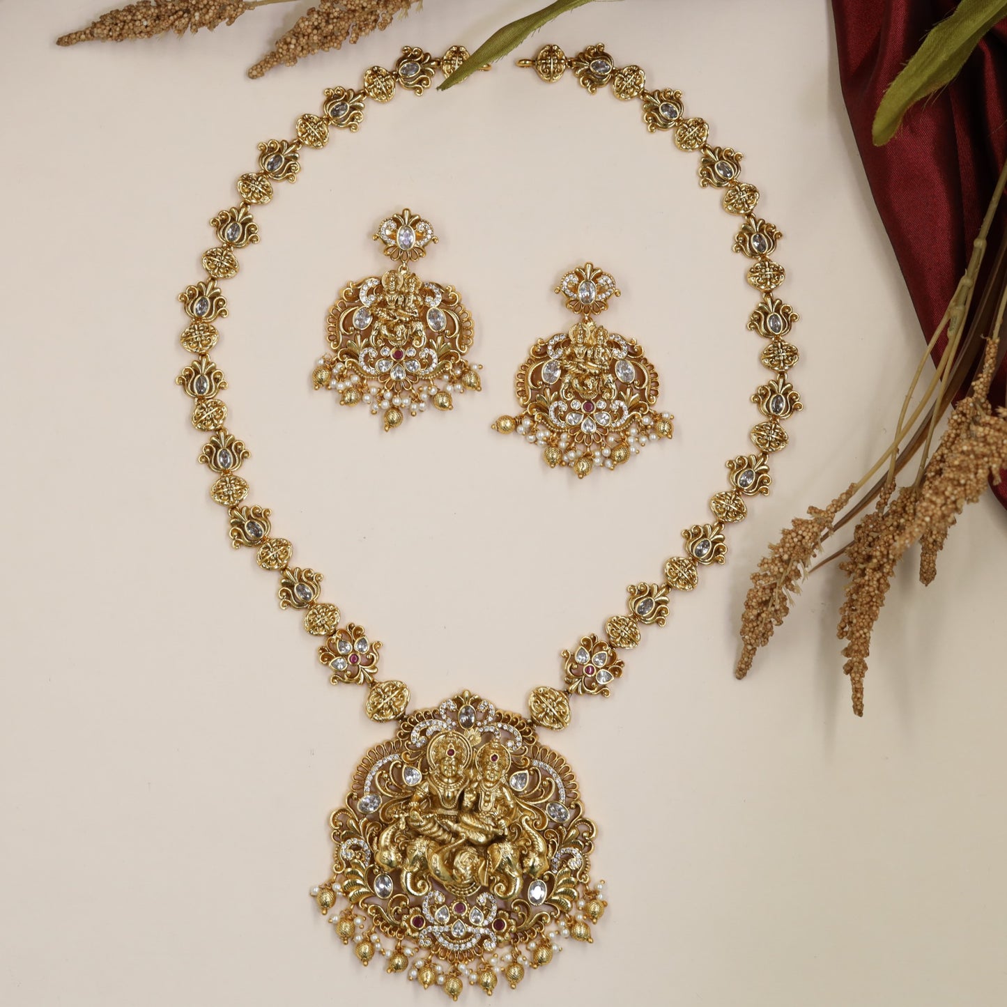 Radha Krishna Antique Long Haara with floral links and ornate pendant work