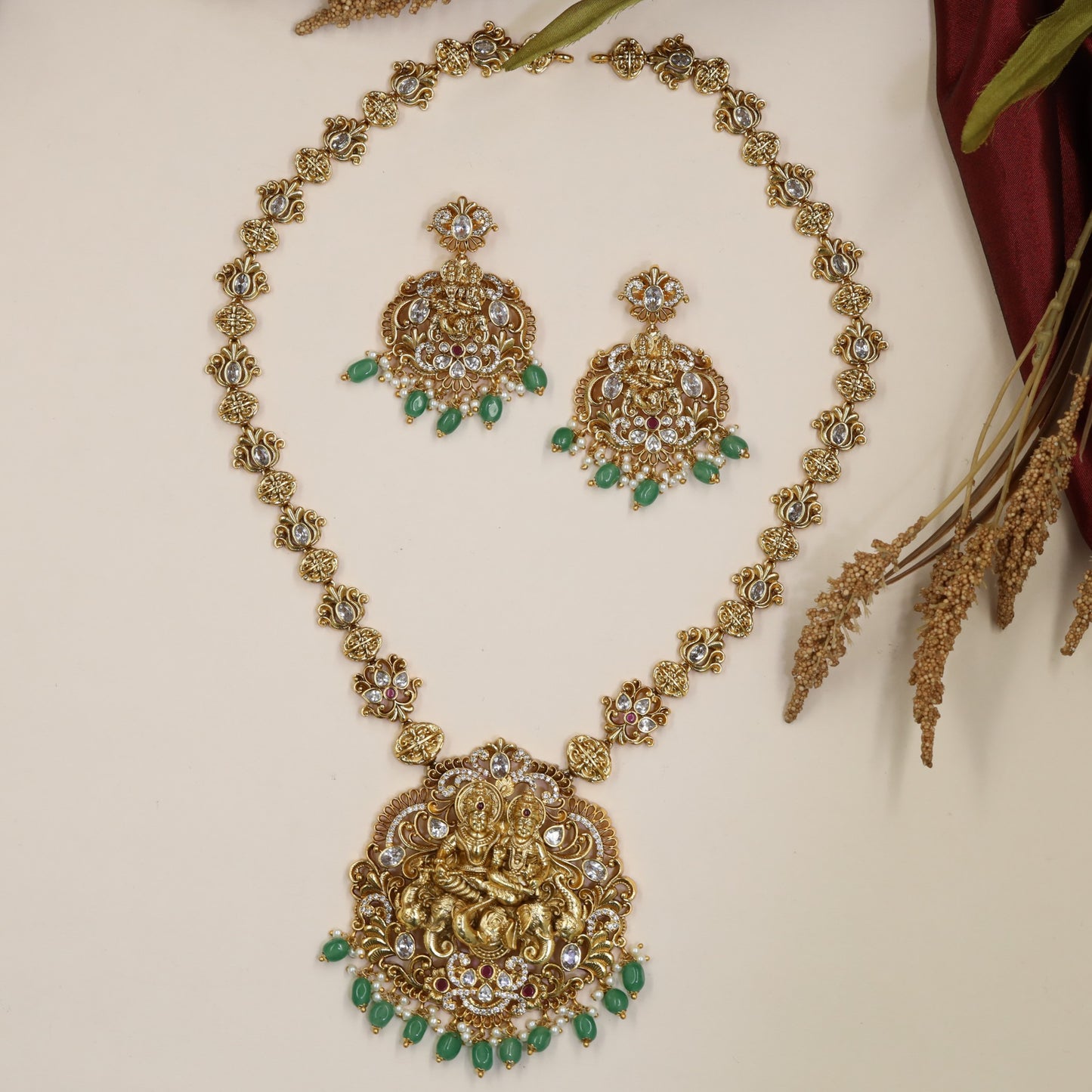 Radha Krishna Antique Long Haara with floral links and ornate pendant work