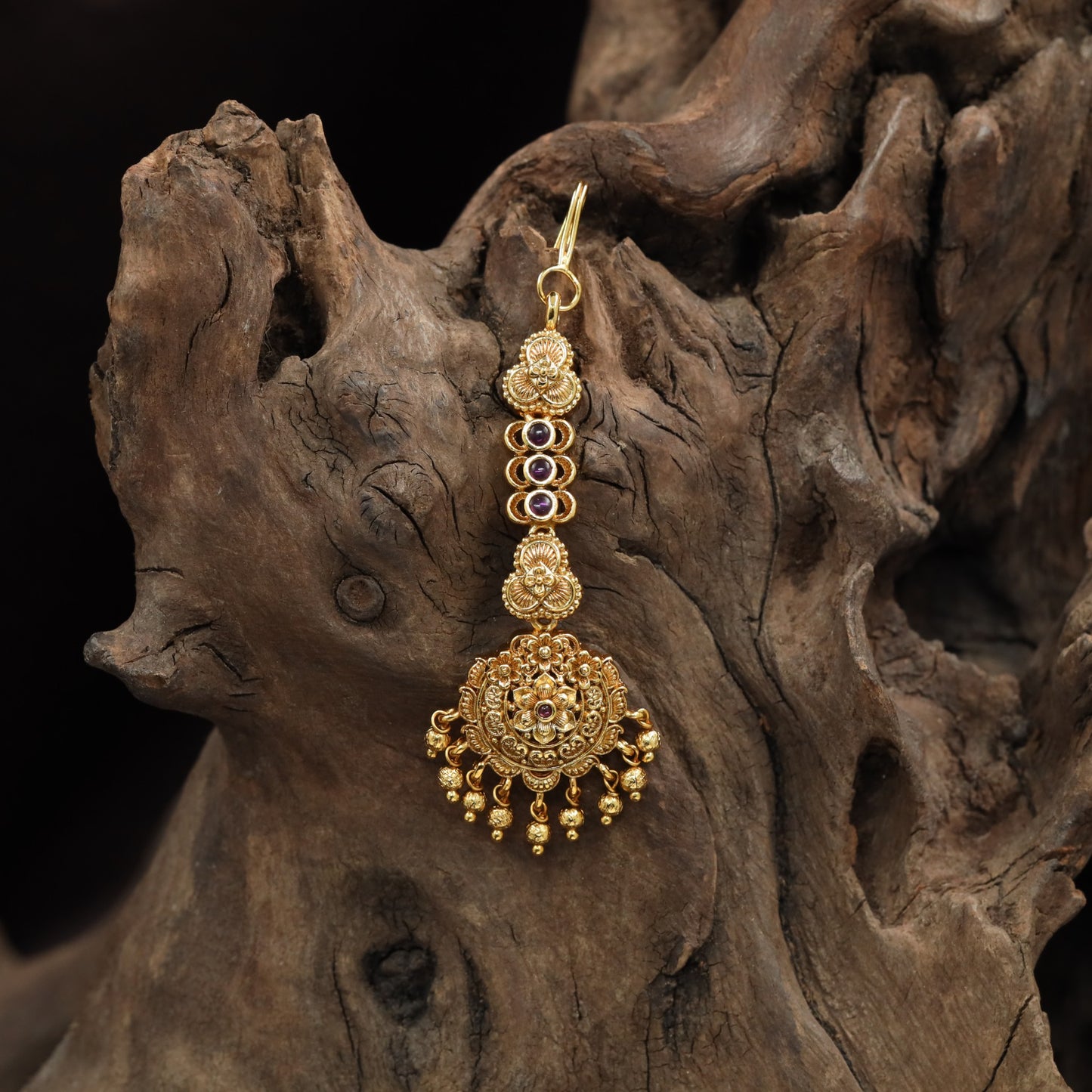 Traditional Antique Tikkas featuring sculpted circular panels and fine detailing