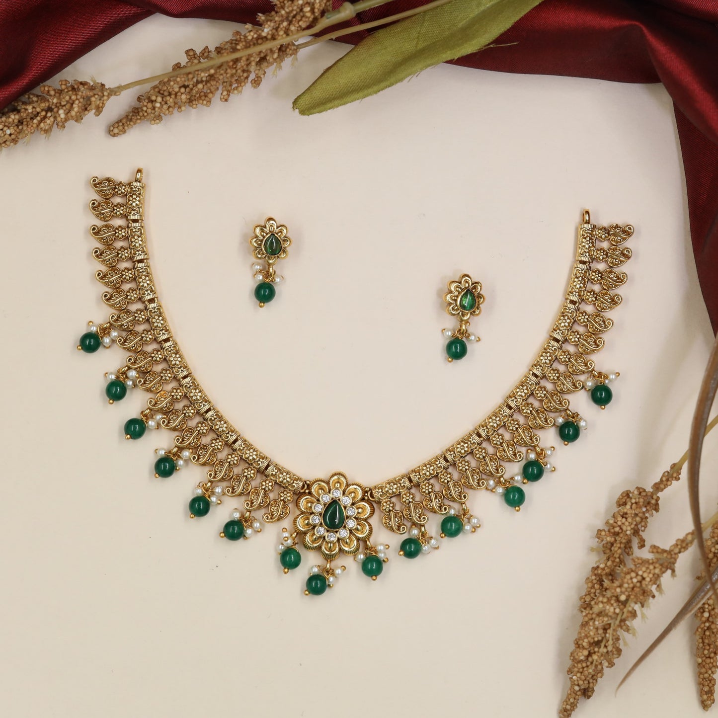 Botanical Antique Necklace featuring repeating floral panels and bead accents