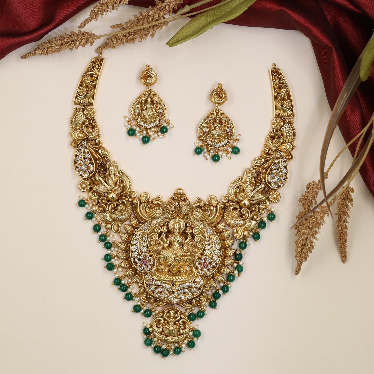 Grand Lakshmi Antique Necklace with sculpted sidework, floral detailing and bead drops