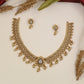 Botanical Antique Necklace featuring repeating floral panels and bead accents