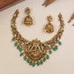 Lotus-Seated Lakshmi Necklace with Curved Flourish Links and Ornamental Drops
