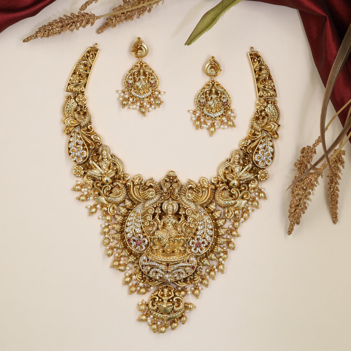 Grand Lakshmi Antique Necklace with sculpted sidework, floral detailing and bead drops