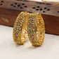 Heritage Bangles with Repeated Peacock Reliefs and Sculpted Floral Elements