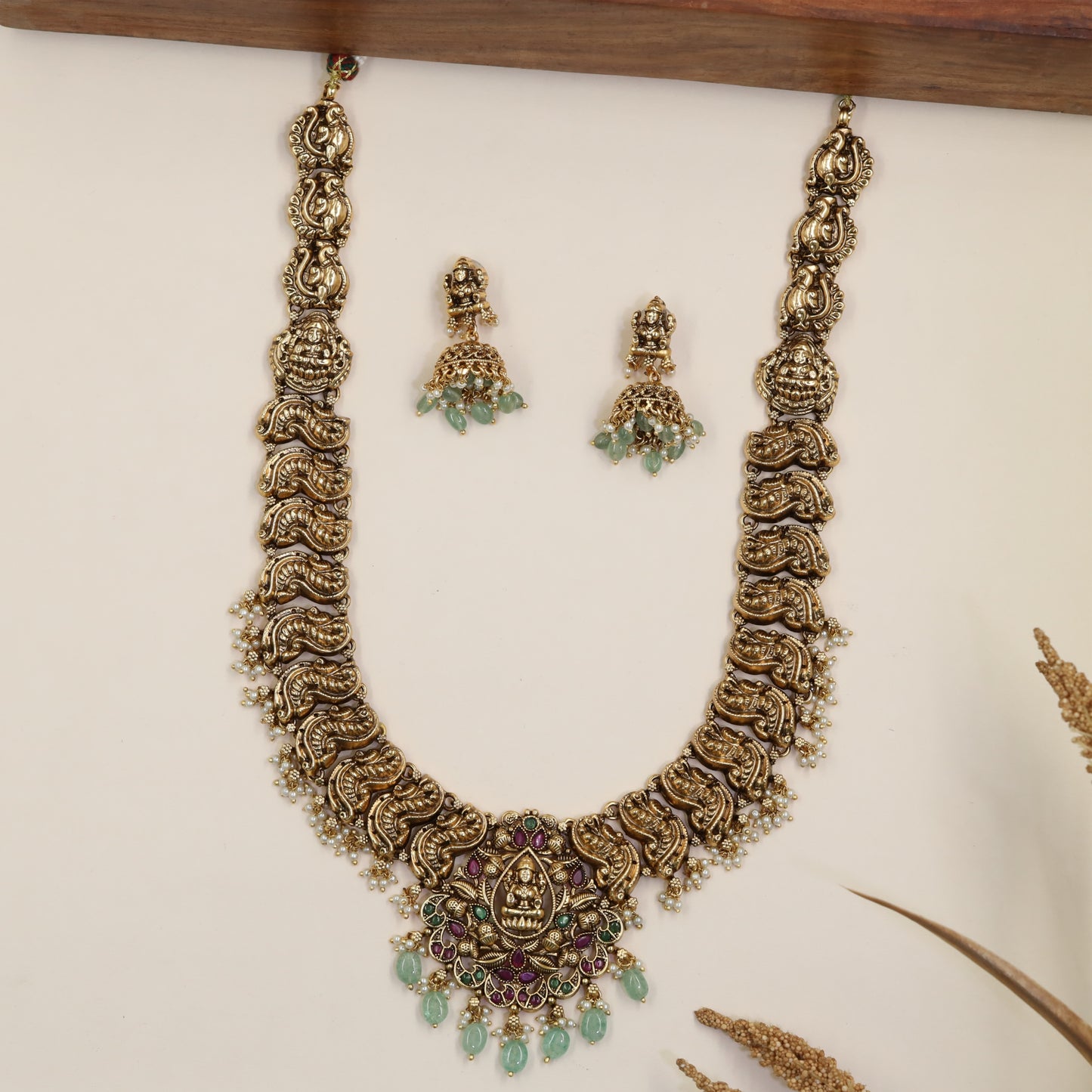 Couture Antique Lakshmi Long Haara with Flowing Scroll Forms and Goddess Centrepiece
