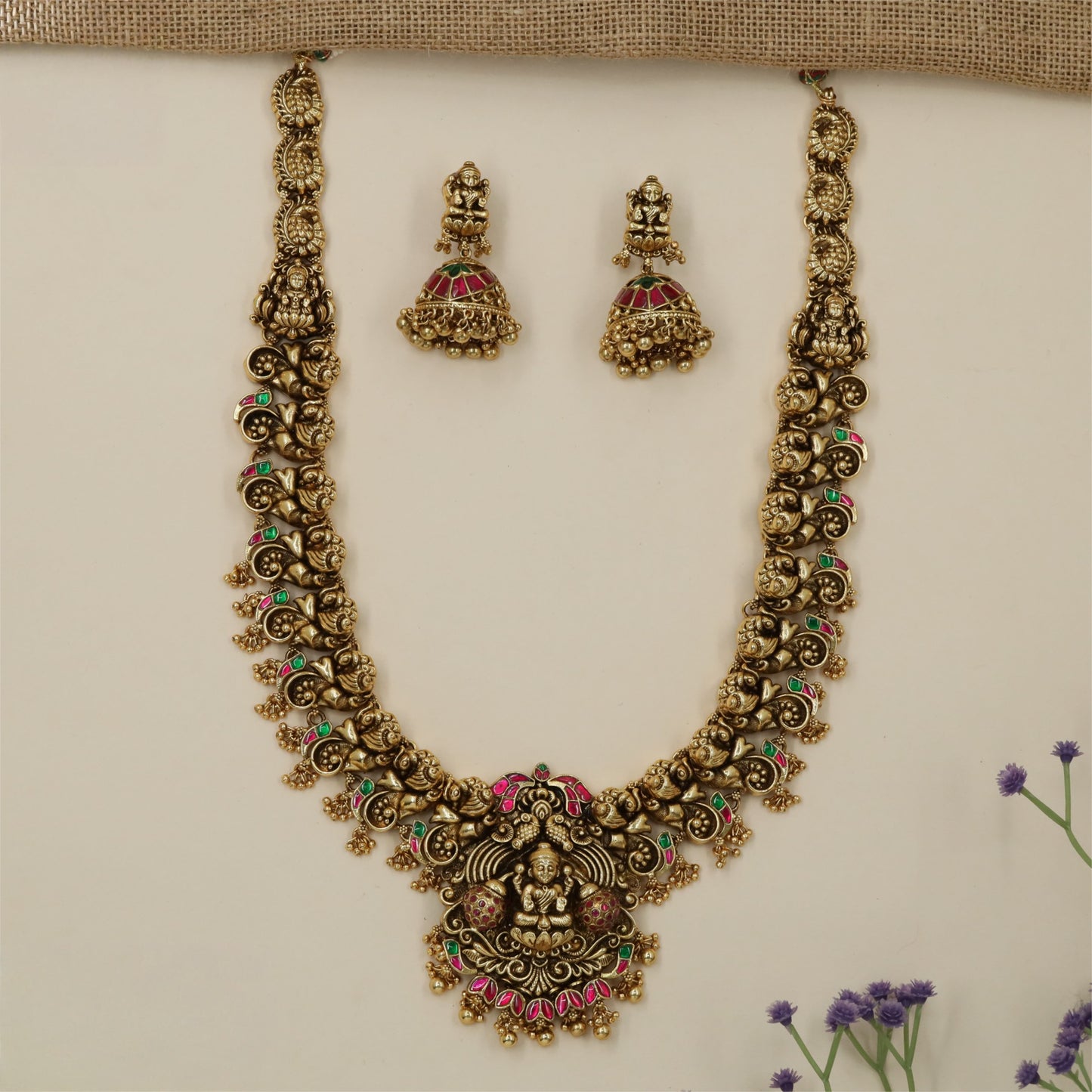 Festive Luxe Lakshmi Haara with Grand Goddess Pendant and Intricate Traditional Detailing