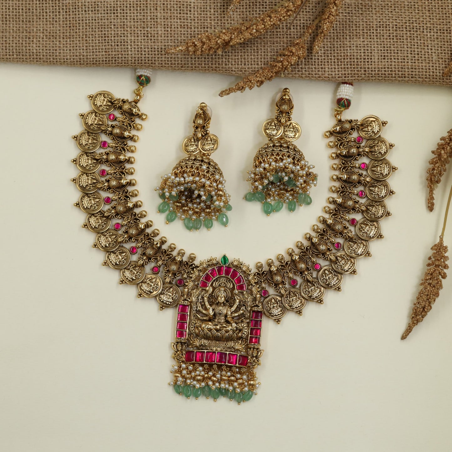 Traditional Lakshmi Necklace with Circular Figurative Links and Elaborate Pendant Design