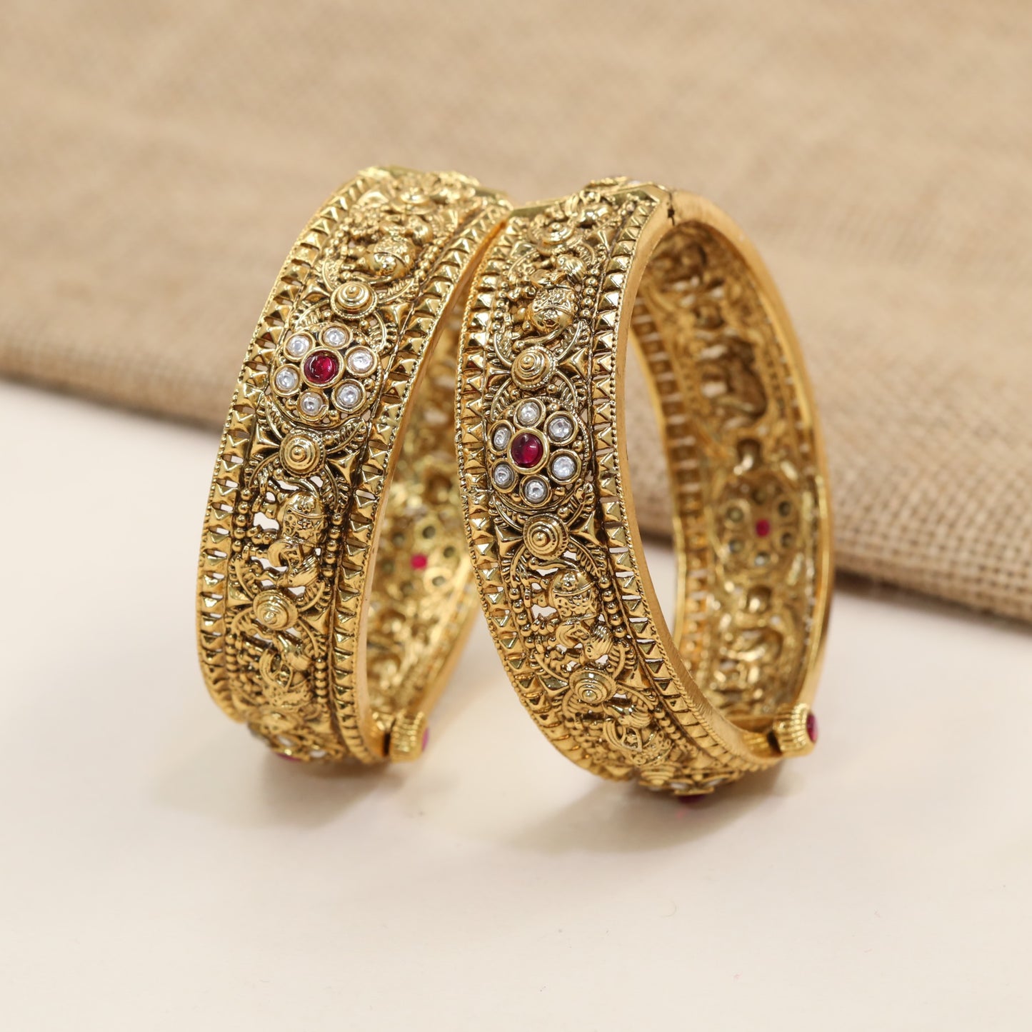 Signature Antique Bangles with Ornate Floral Panels and Sculpted Scrollwork