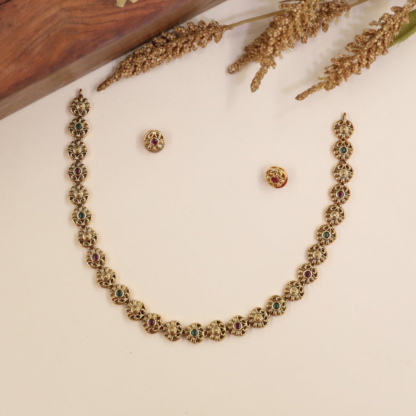 Antique Necklace Showcasing Intricate Floral Links and Curved Petal Work