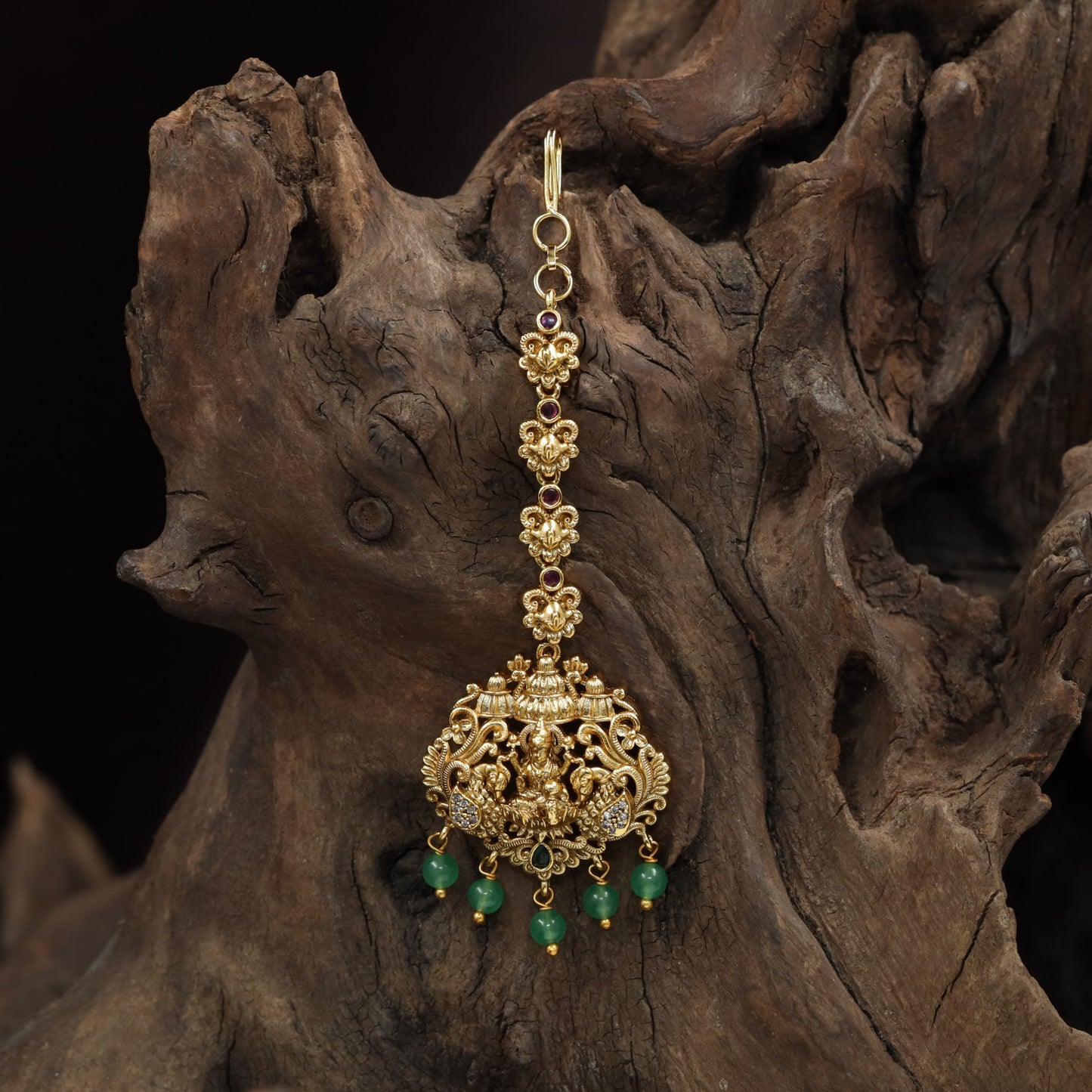 Refined Lakshmi Antique Tikka with peacock flourishes and decorative linkwork