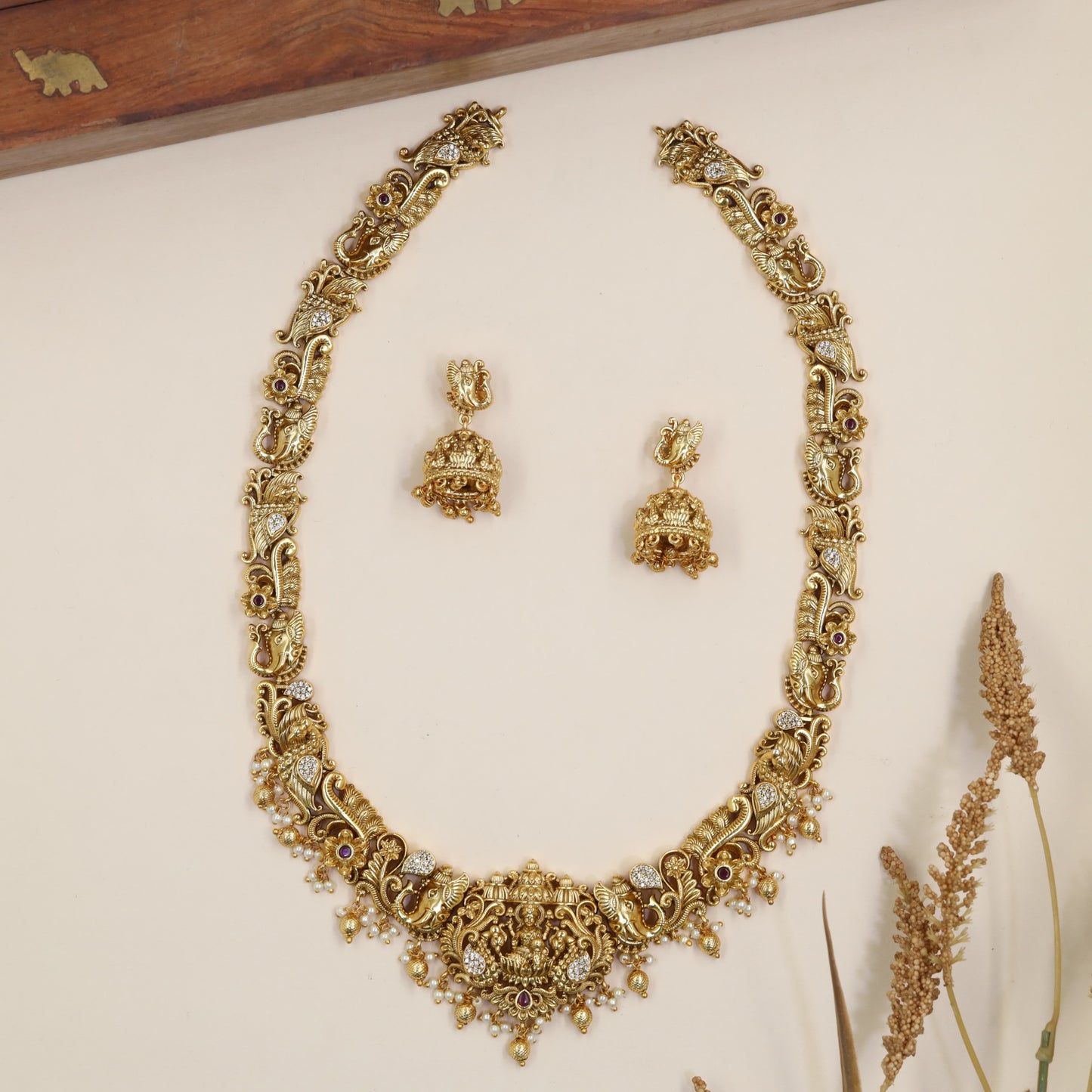 Lakshmi Long Haara With Intricate Curved Sections And Hanging Drops